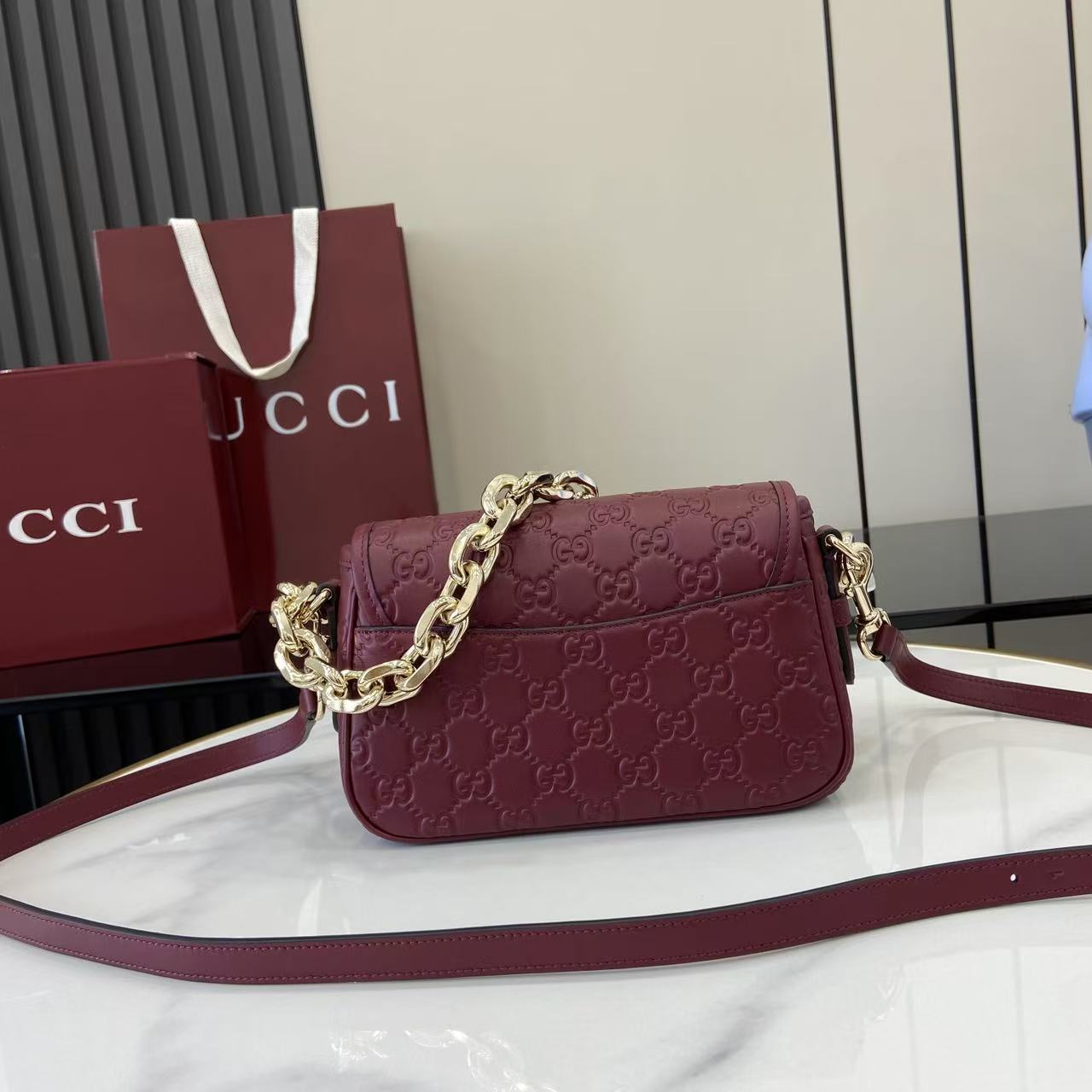 Gucci GG Emblem Small Shoulder Bag - FashionPlug