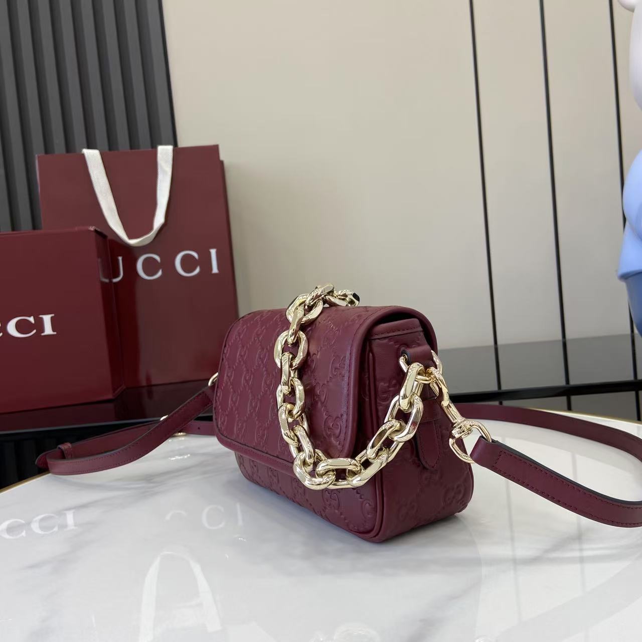 Gucci GG Emblem Small Shoulder Bag - FashionPlug