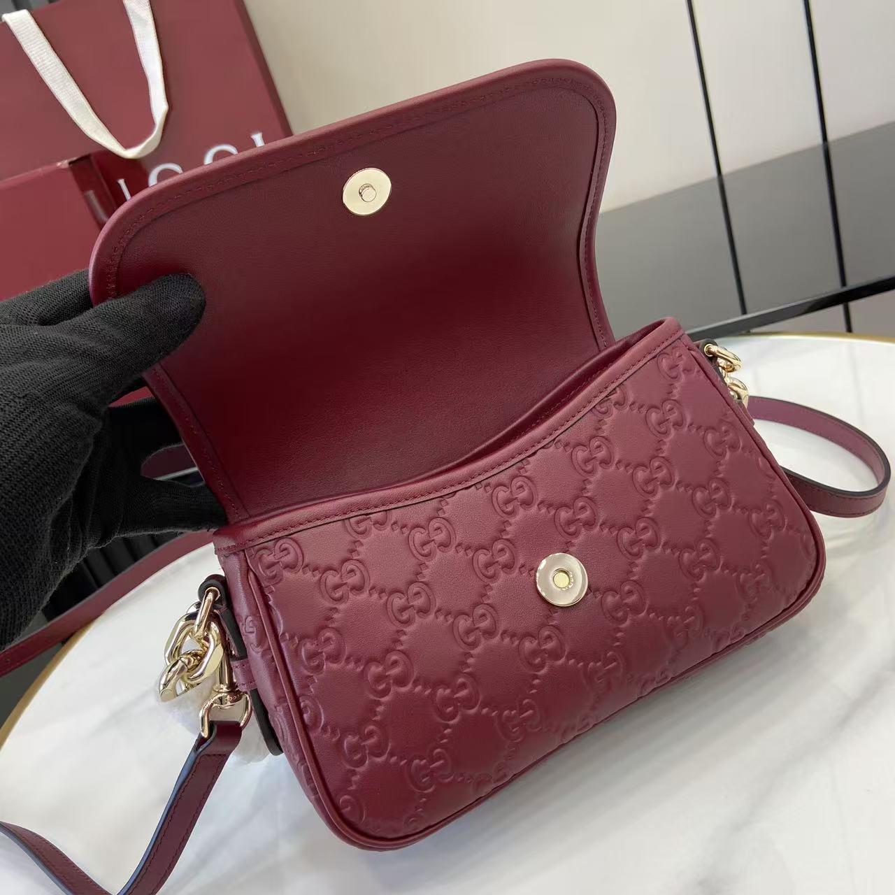 Gucci GG Emblem Small Shoulder Bag - FashionPlug