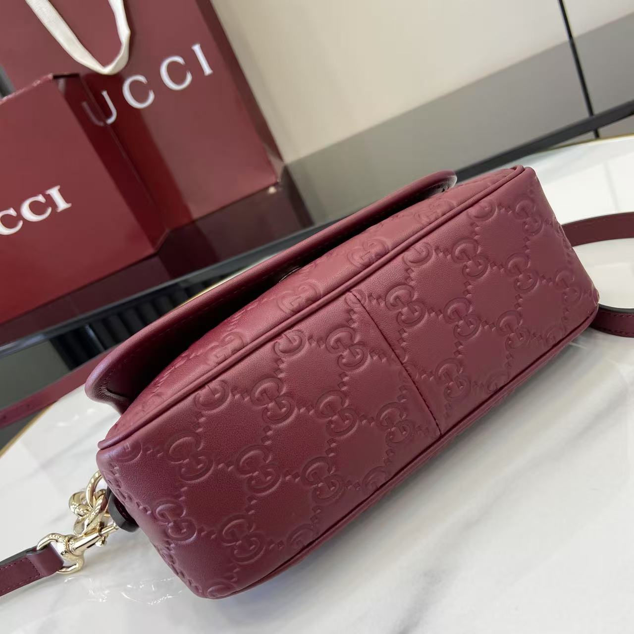 Gucci GG Emblem Small Shoulder Bag - FashionPlug