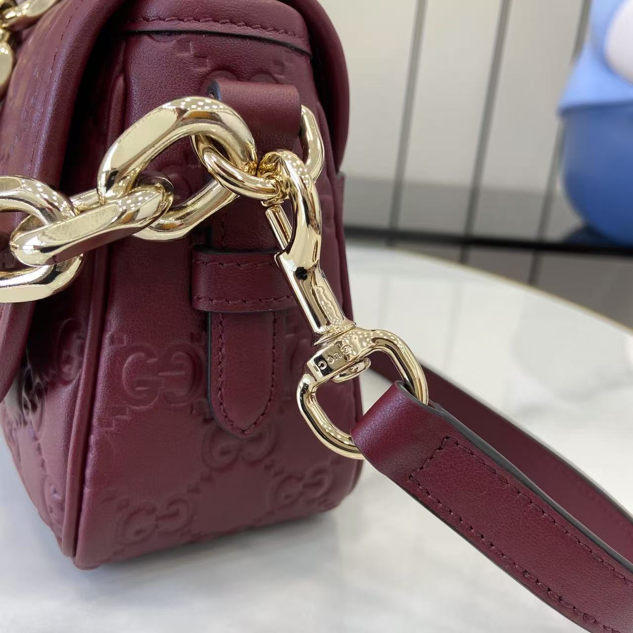 Gucci GG Emblem Small Shoulder Bag - FashionPlug