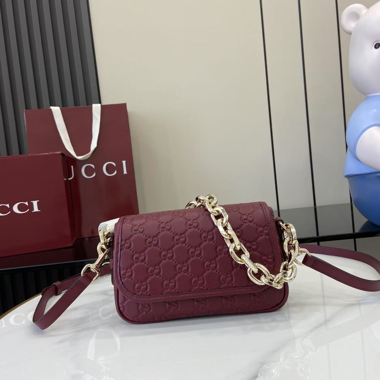 Gucci GG Emblem Small Shoulder Bag - FashionPlug