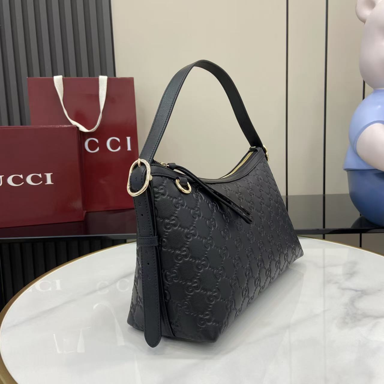 Gucci GG Emblem Medium Shoulder Bag - FashionPlug