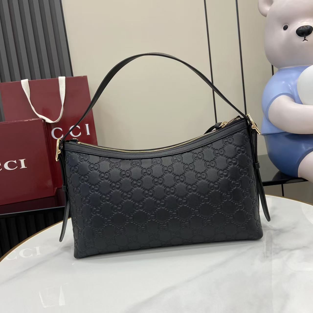 Gucci GG Emblem Medium Shoulder Bag - FashionPlug