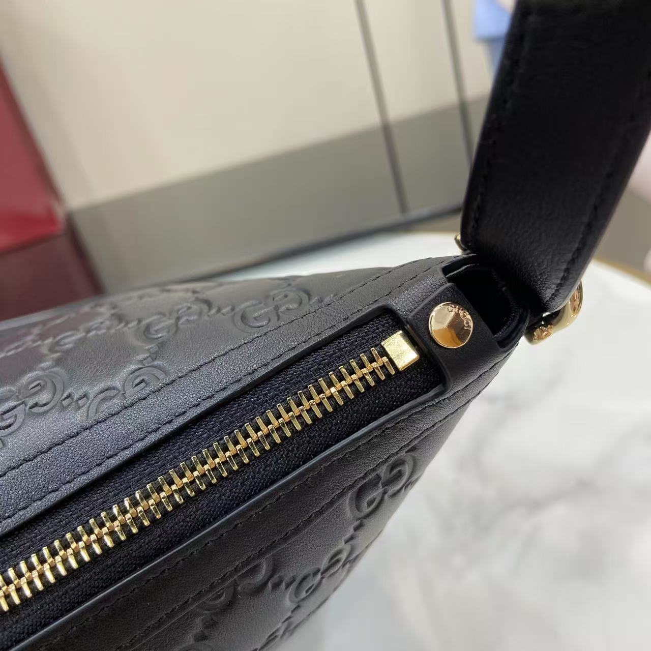 Gucci GG Emblem Medium Shoulder Bag - FashionPlug