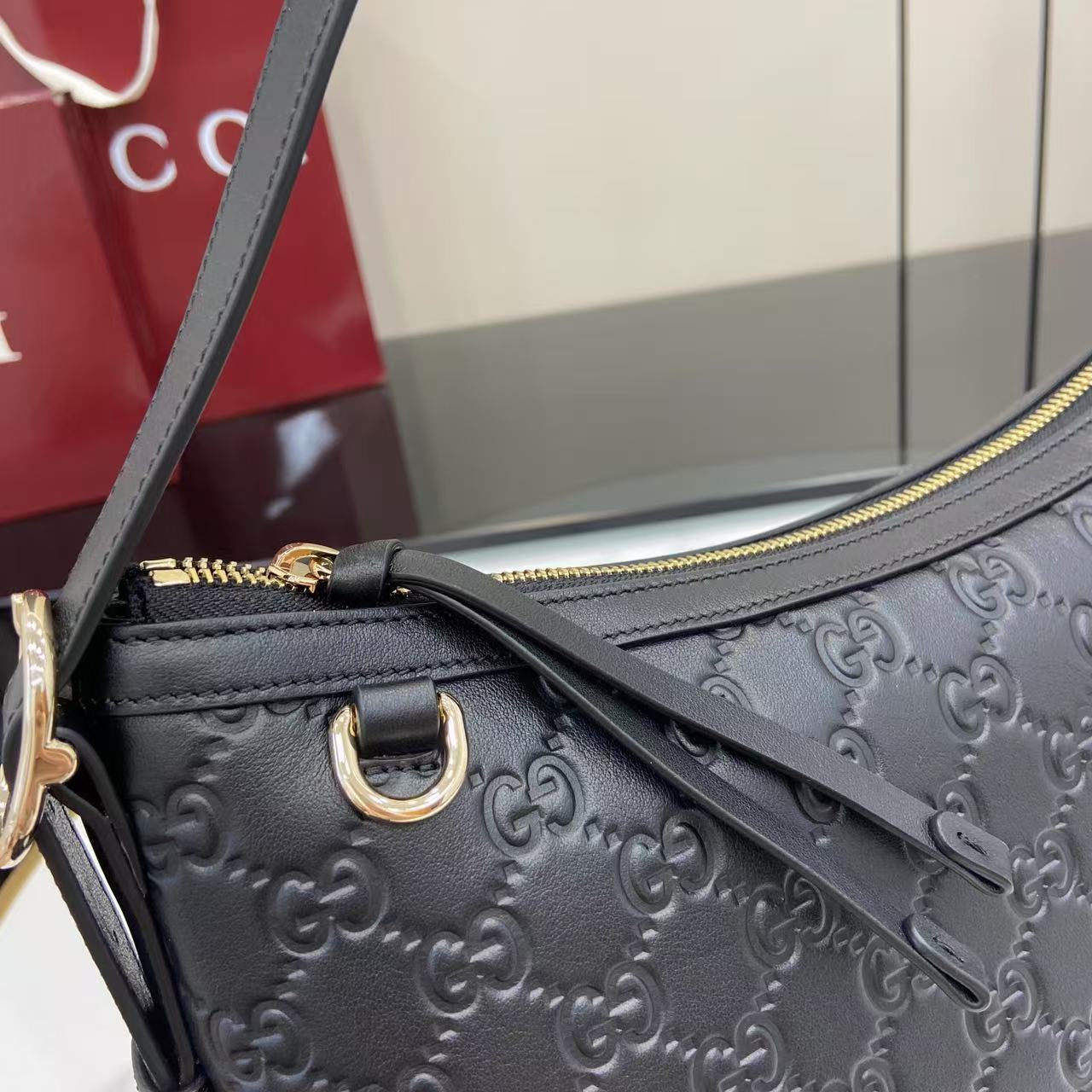 Gucci GG Emblem Medium Shoulder Bag - FashionPlug