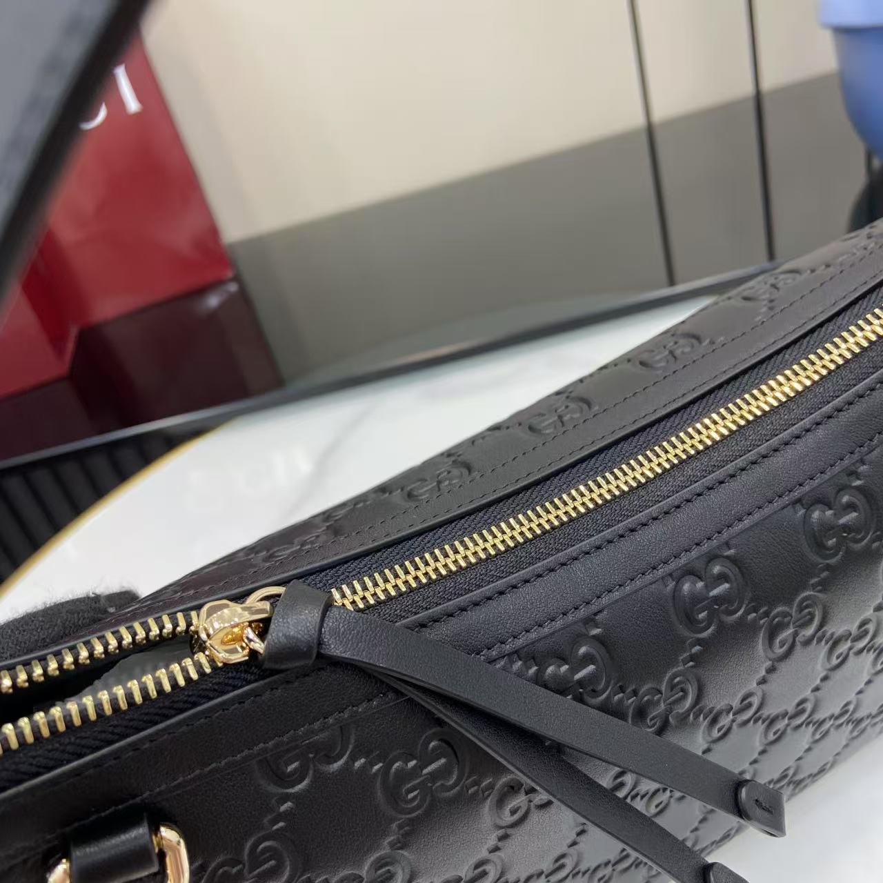 Gucci GG Emblem Medium Shoulder Bag - FashionPlug