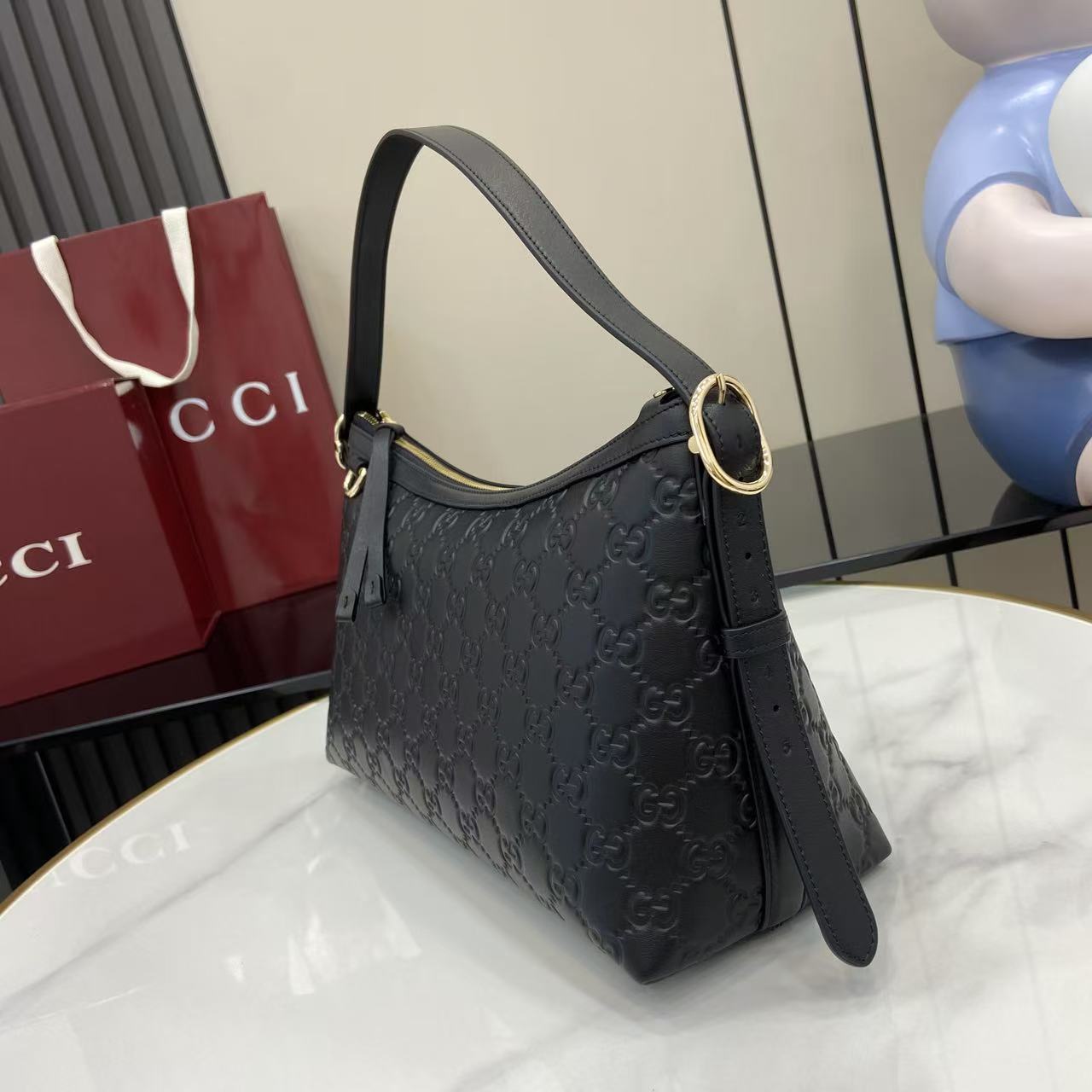 Gucci GG Emblem Medium Shoulder Bag - FashionPlug