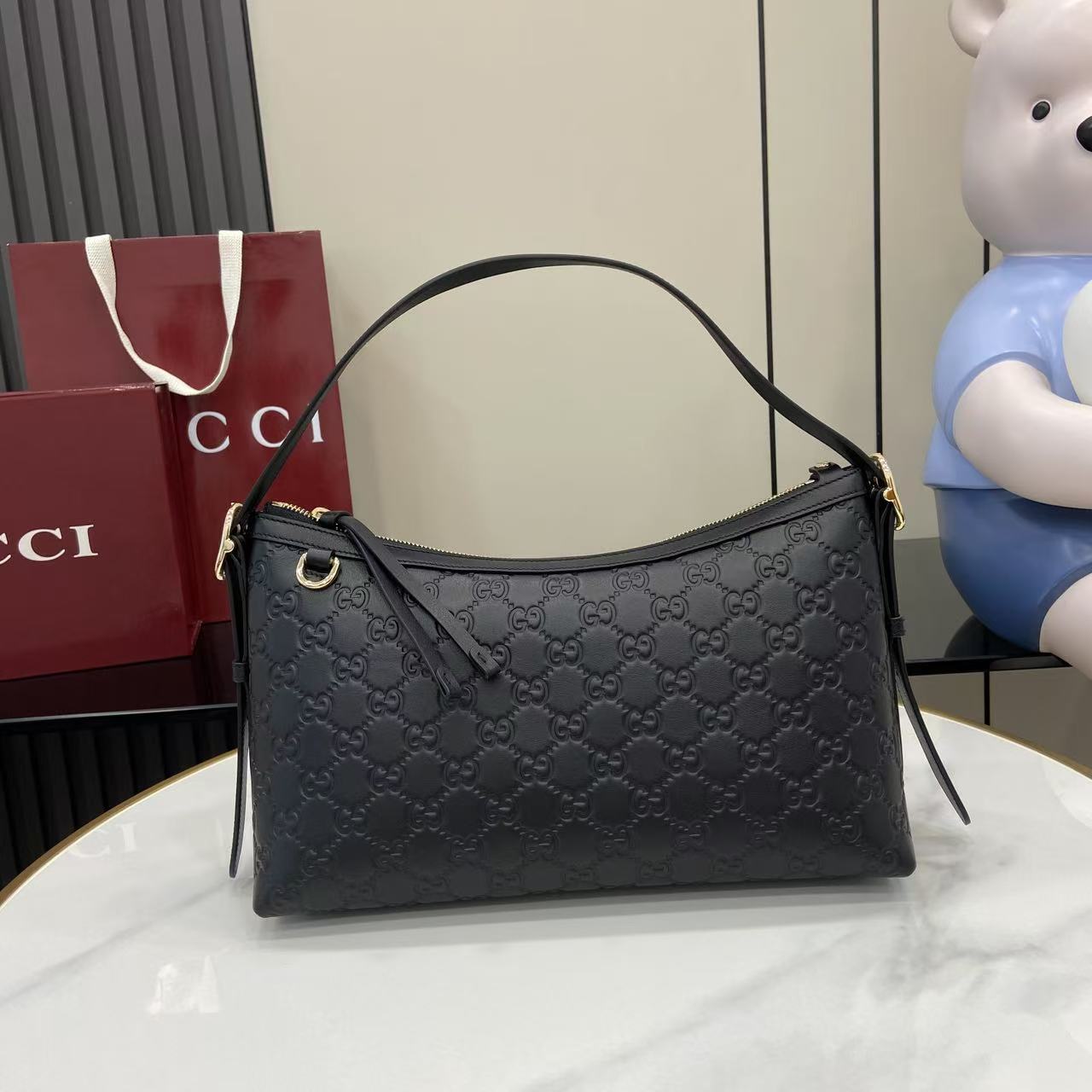 Gucci GG Emblem Medium Shoulder Bag - FashionPlug