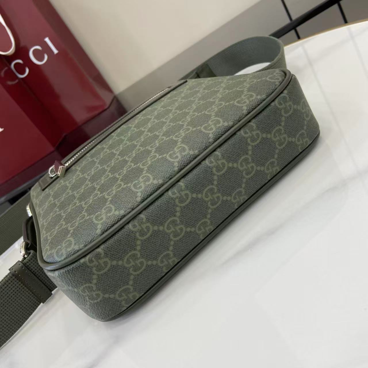 Gucci GG Monogram Small Messenger Bag - FashionPlug
