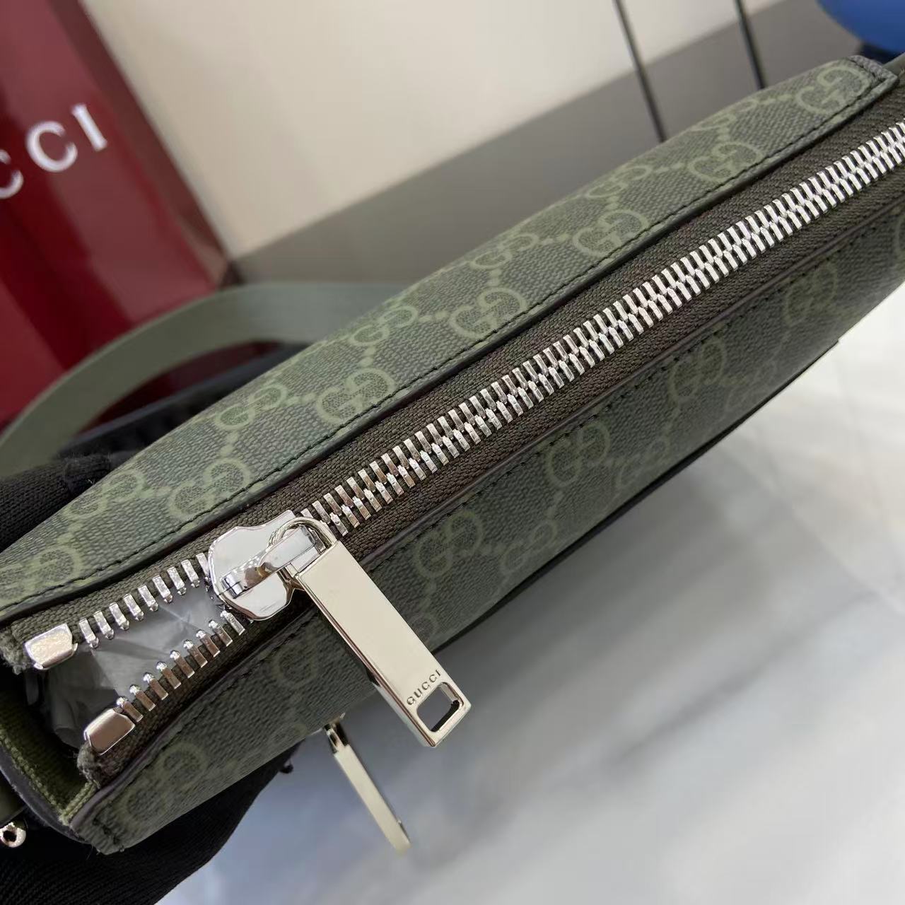 Gucci GG Monogram Small Messenger Bag - FashionPlug