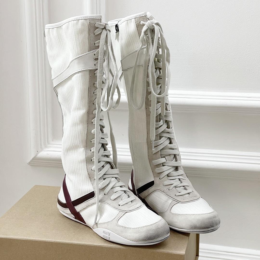 Miu Miu Panelled Boots - FashionPlug
