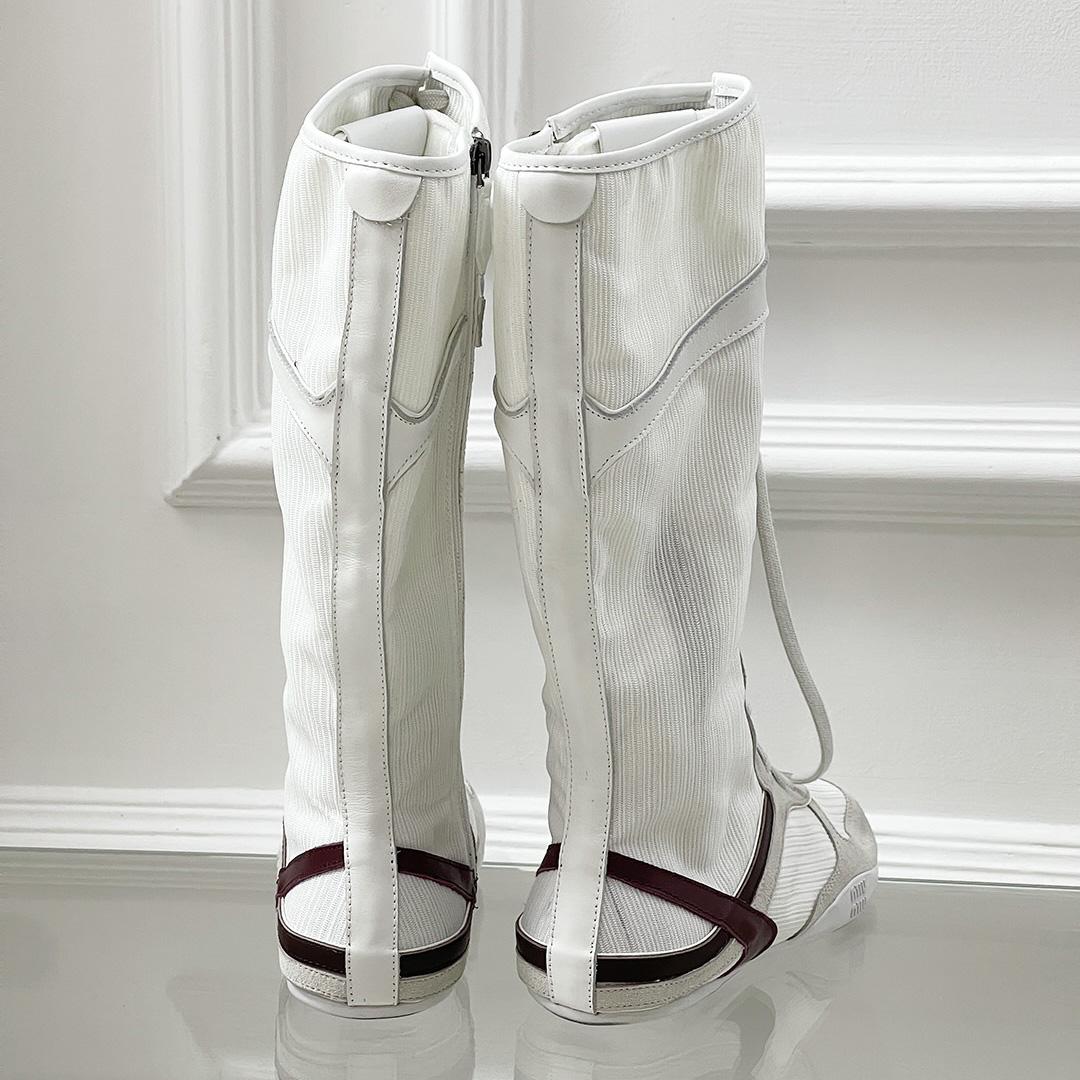 Miu Miu Panelled Boots - FashionPlug