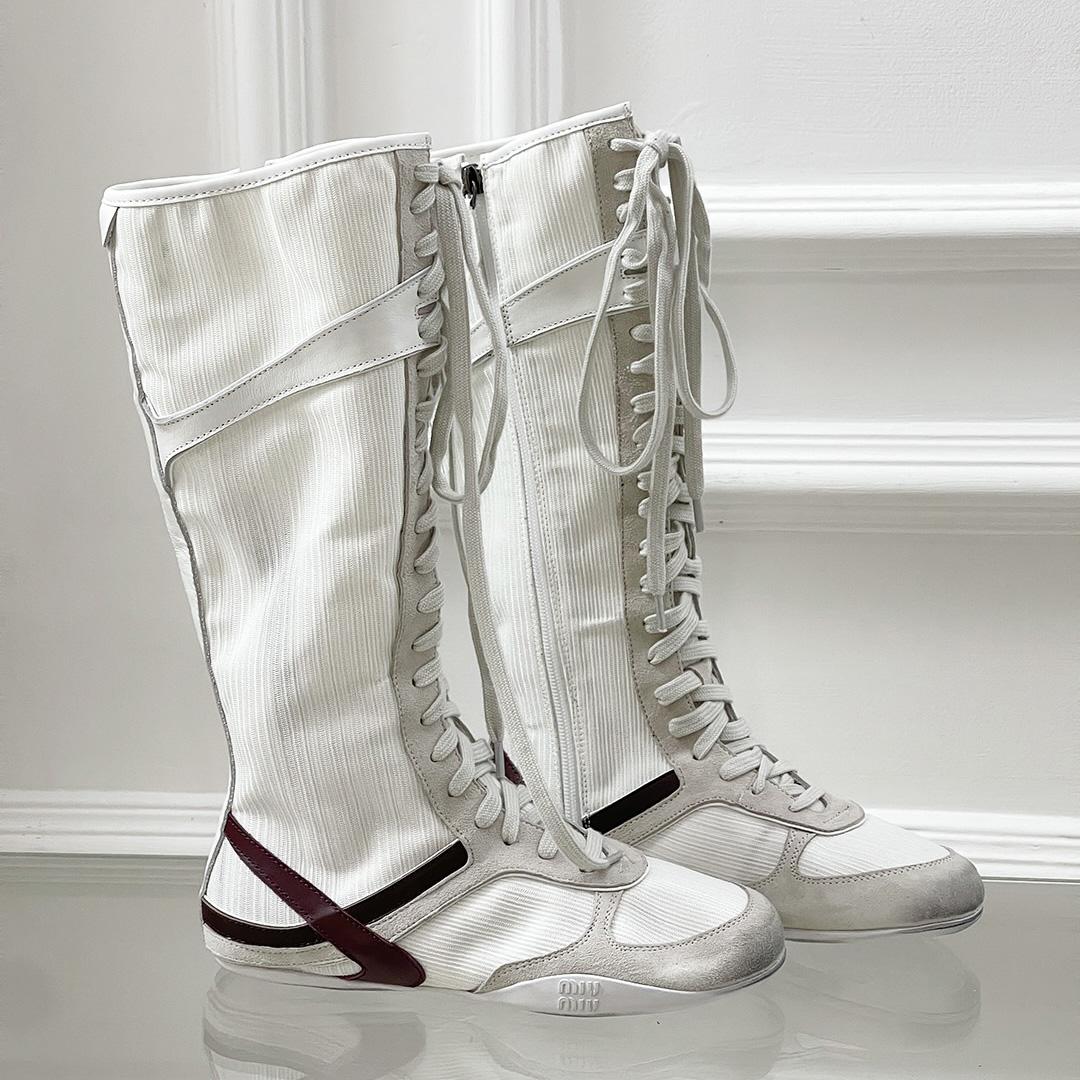 Miu Miu Panelled Boots - FashionPlug
