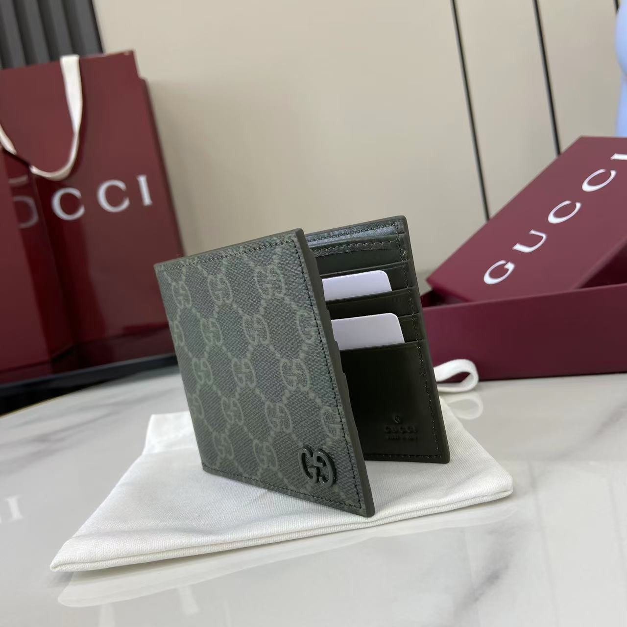Gucci GG Monogram Bi-fold Wallet - FashionPlug