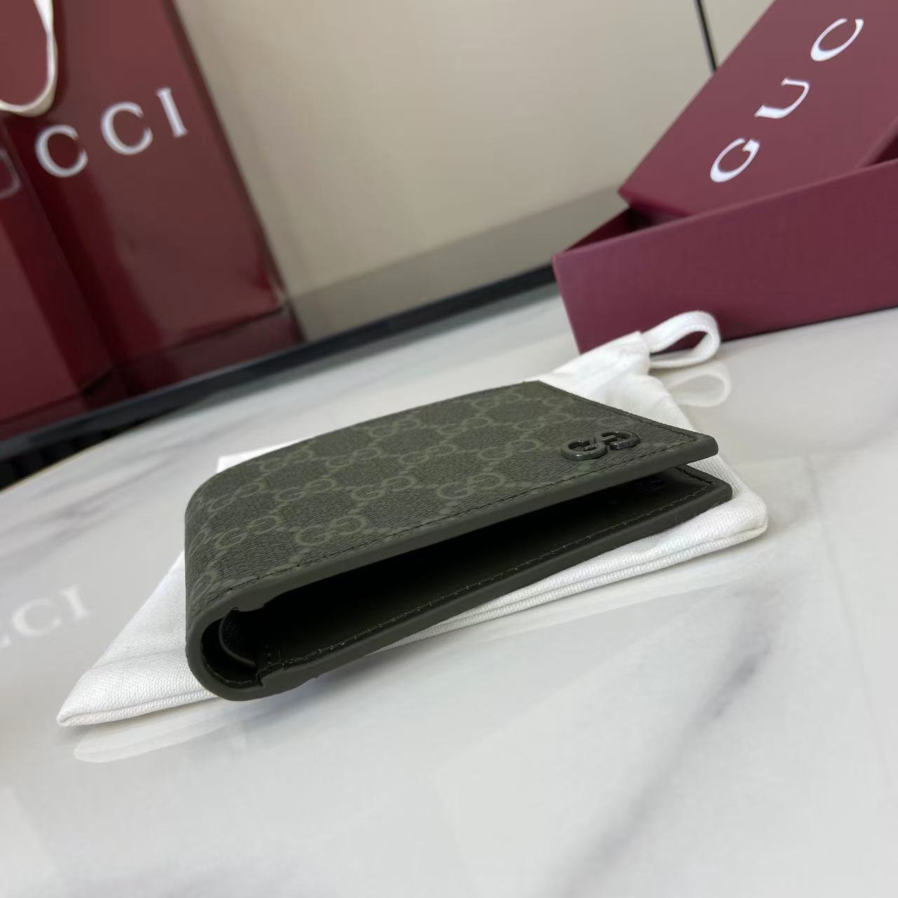 Gucci GG Monogram Bi-fold Wallet - FashionPlug