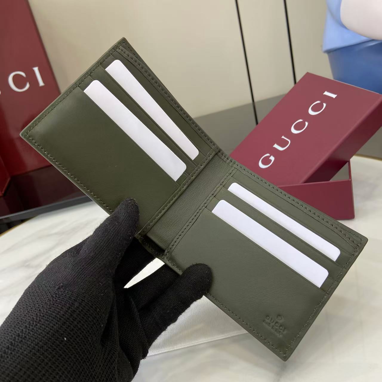 Gucci GG Monogram Bi-fold Wallet - FashionPlug