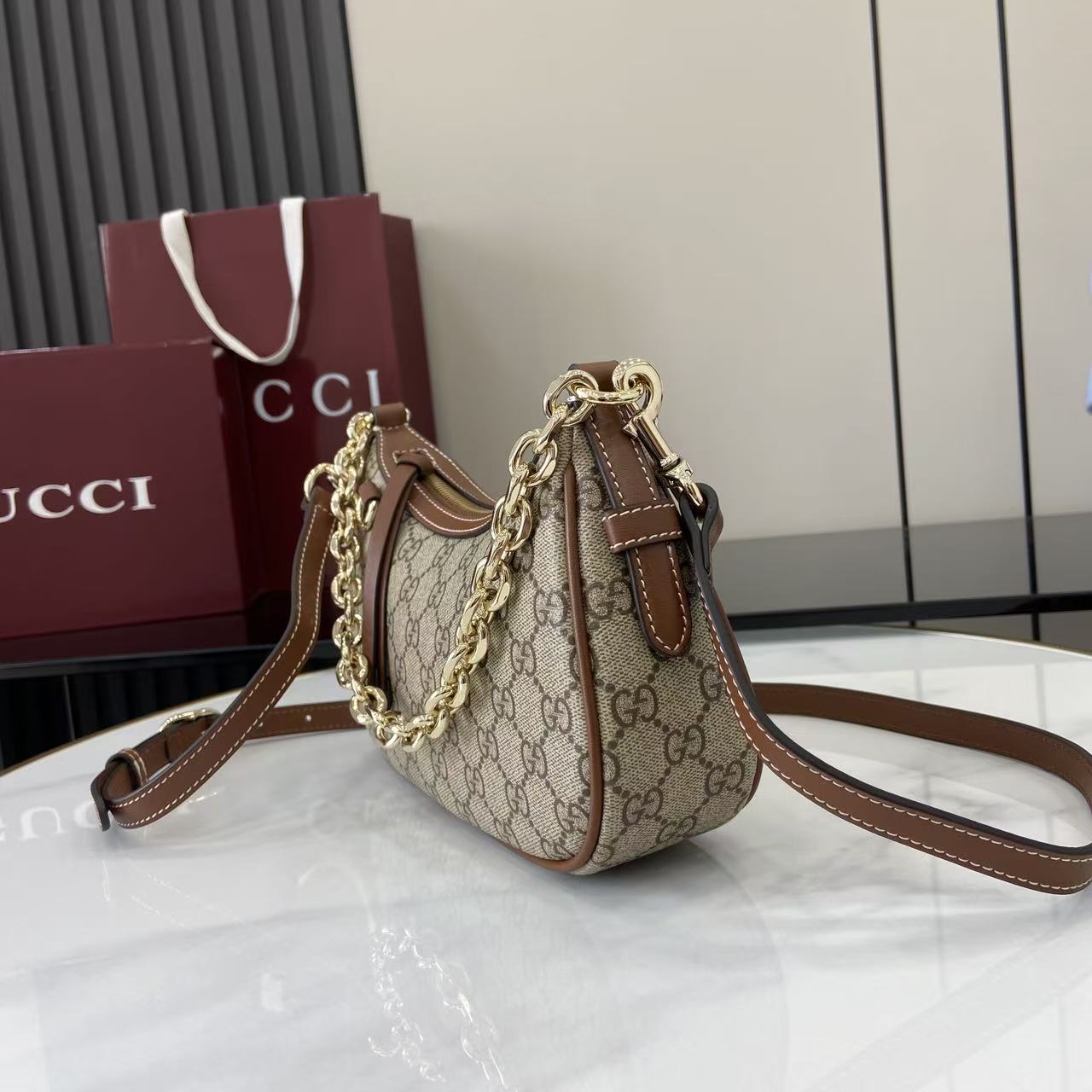 Gucci GG Emblem Small Shoulder Bag - FashionPlug