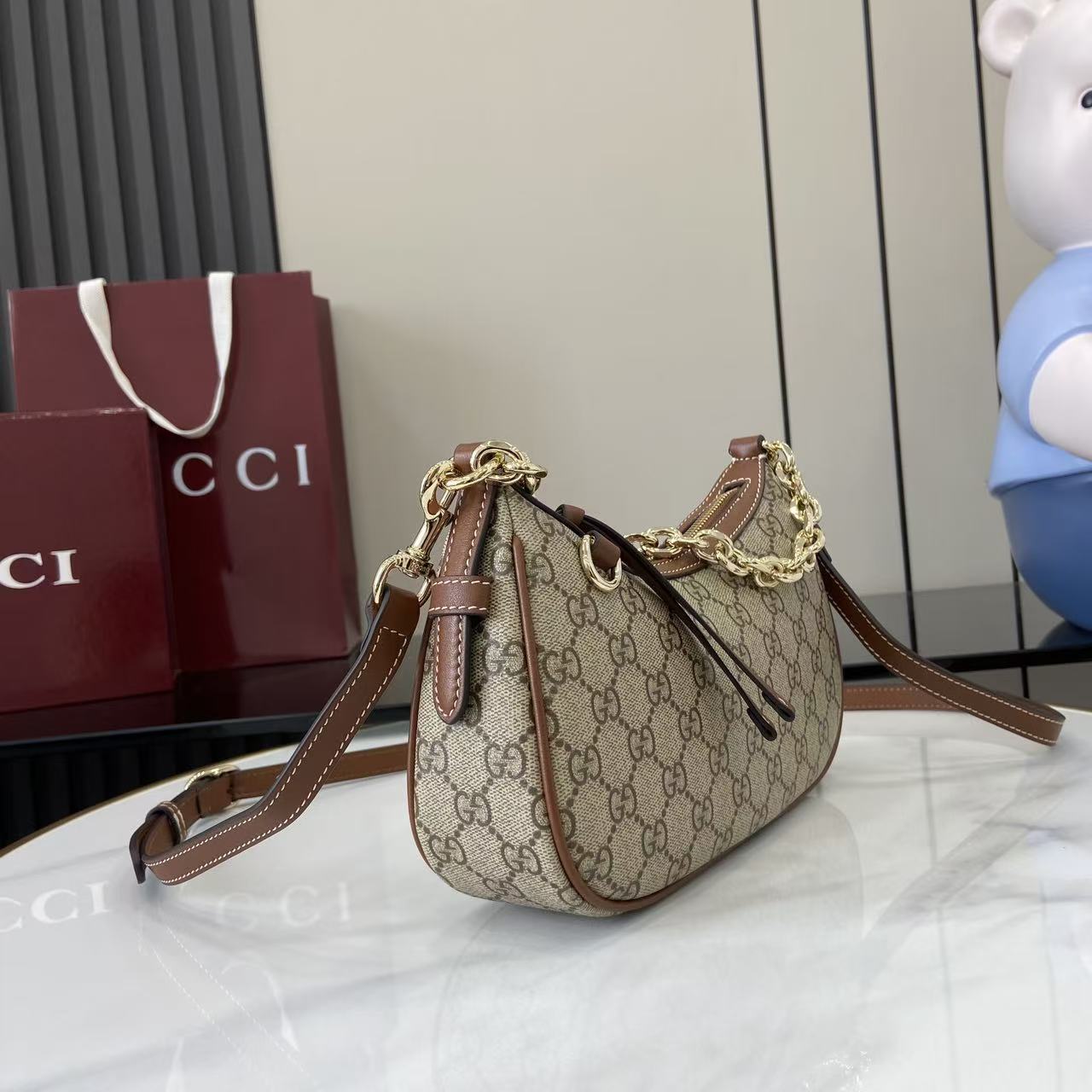 Gucci GG Emblem Small Shoulder Bag - FashionPlug