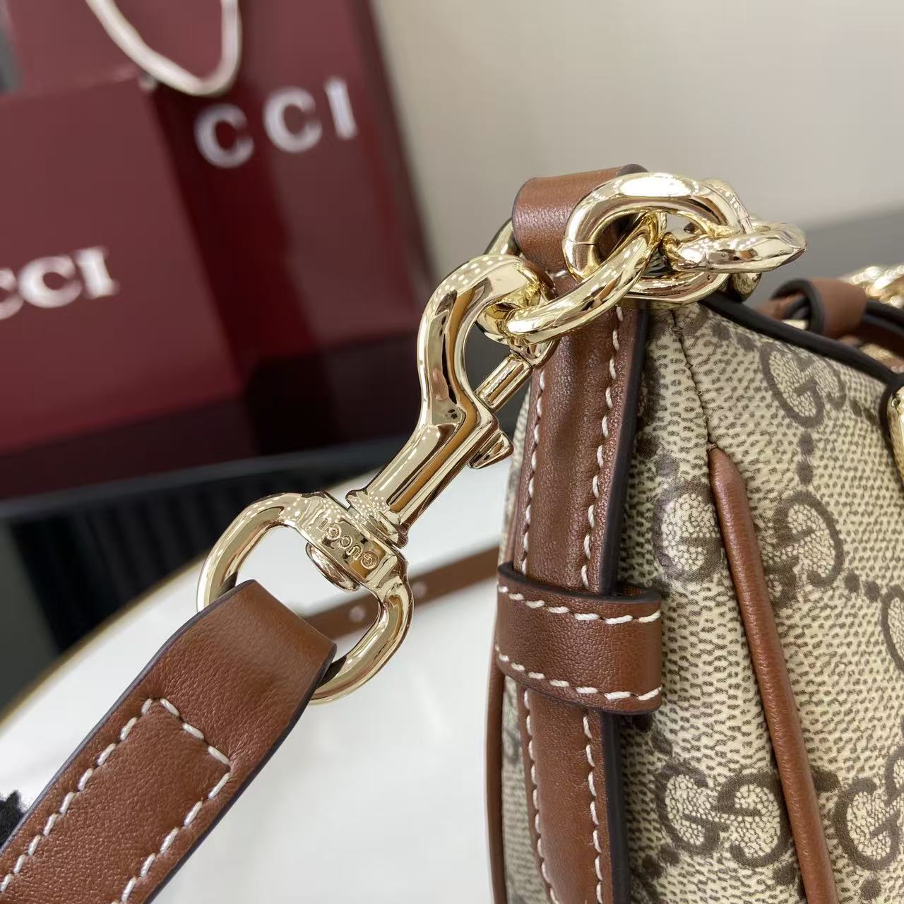 Gucci GG Emblem Small Shoulder Bag - FashionPlug