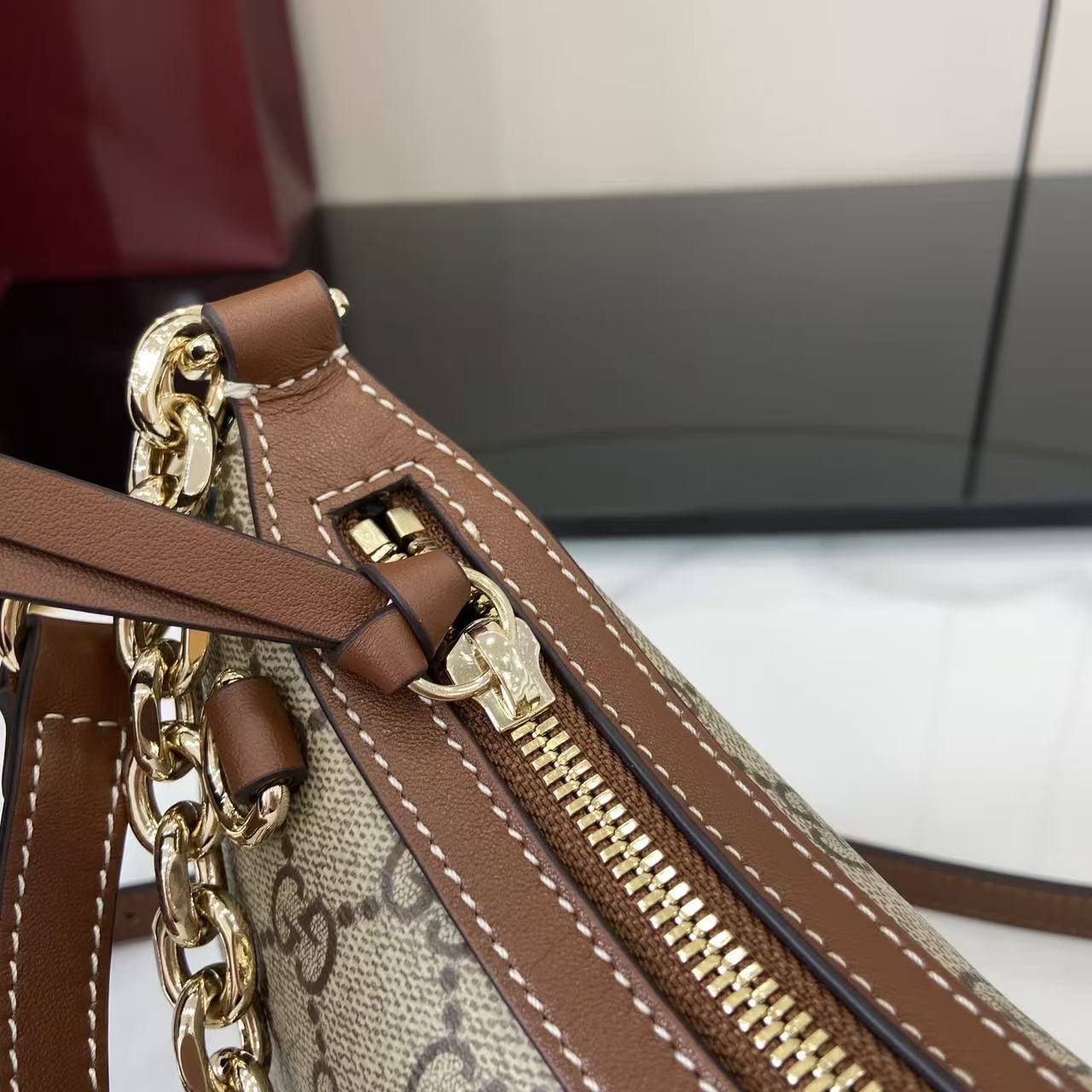 Gucci GG Emblem Small Shoulder Bag - FashionPlug