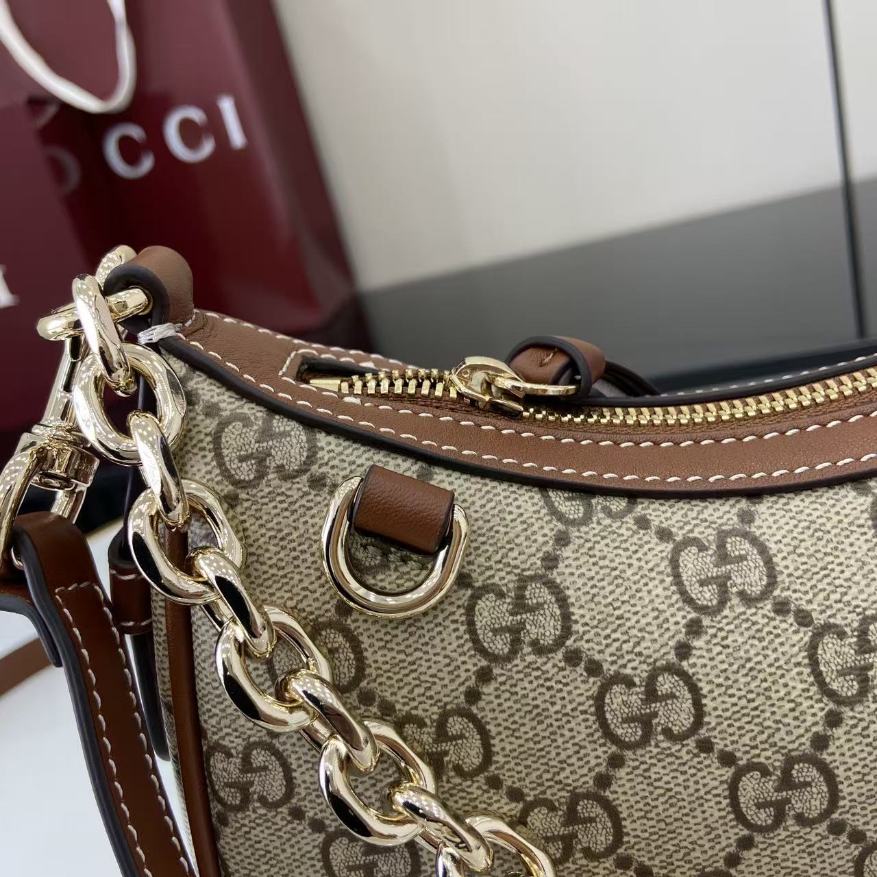 Gucci GG Emblem Small Shoulder Bag - FashionPlug