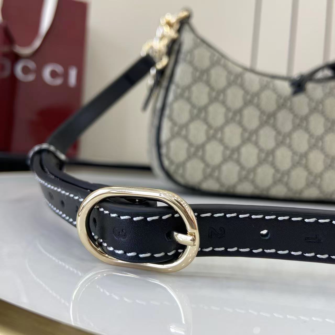 Gucci GG Emblem Small Shoulder Bag - FashionPlug