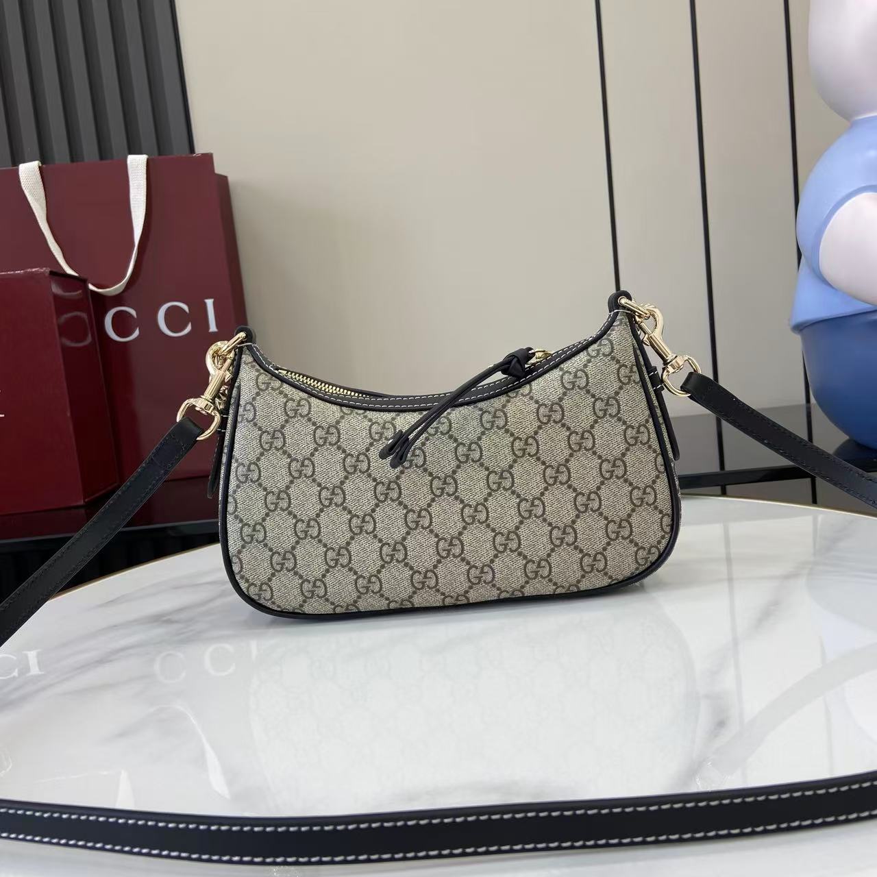 Gucci GG Emblem Small Shoulder Bag - FashionPlug