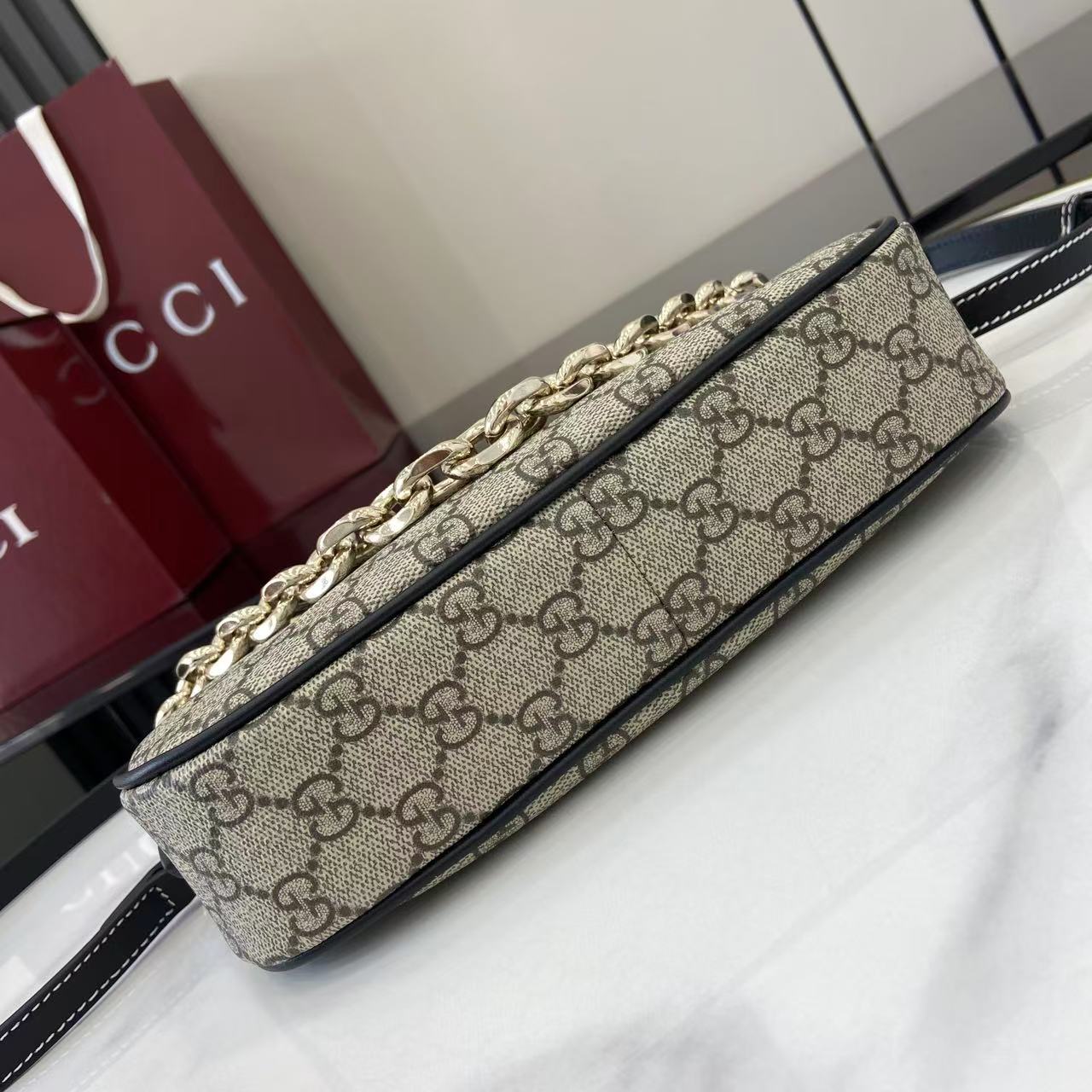 Gucci GG Emblem Small Shoulder Bag - FashionPlug