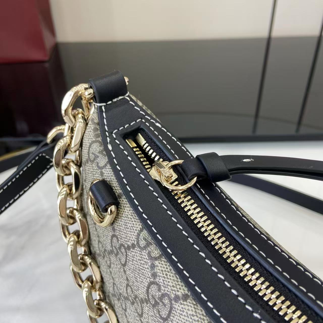Gucci GG Emblem Small Shoulder Bag - FashionPlug