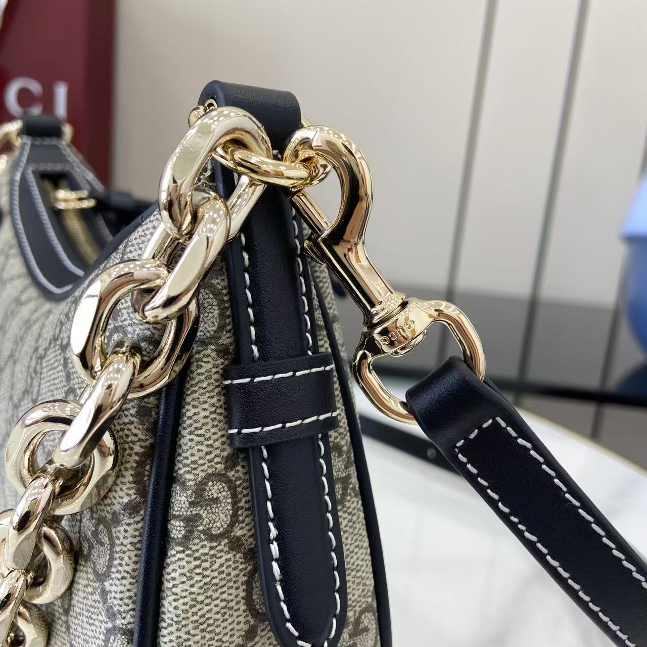 Gucci GG Emblem Small Shoulder Bag - FashionPlug