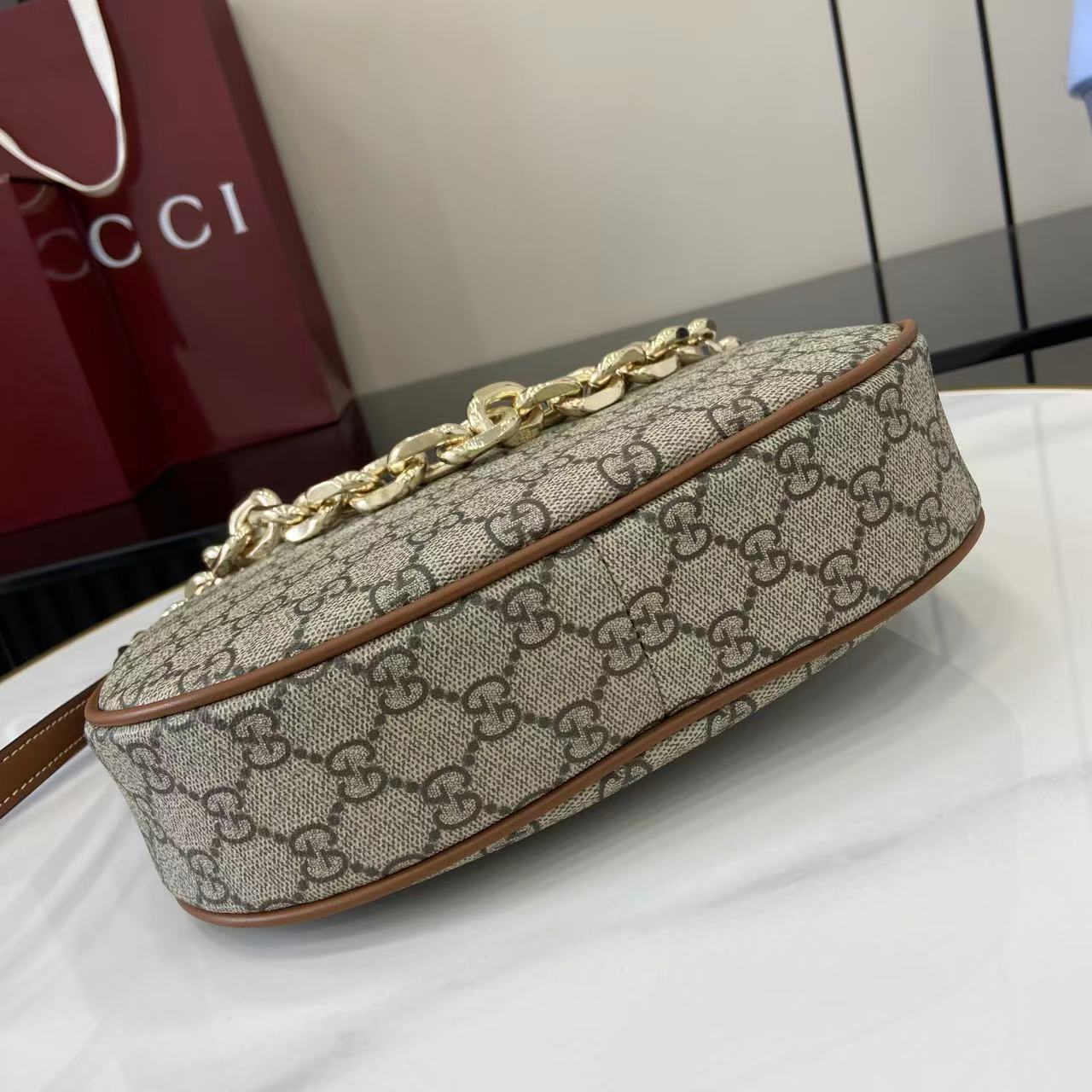 Gucci GG Emblem Medium Shoulder Bag - FashionPlug