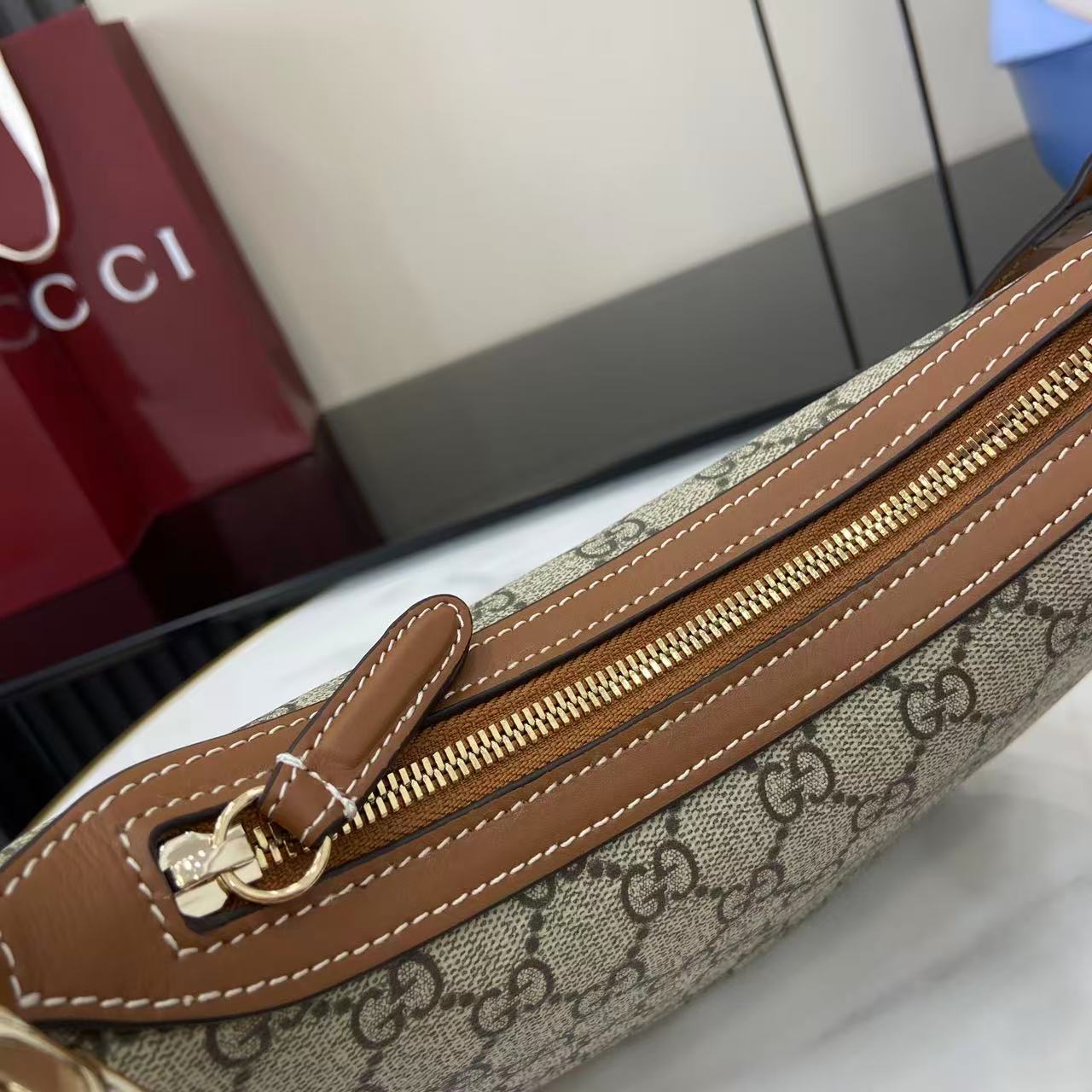 Gucci GG Emblem Medium Shoulder Bag - FashionPlug