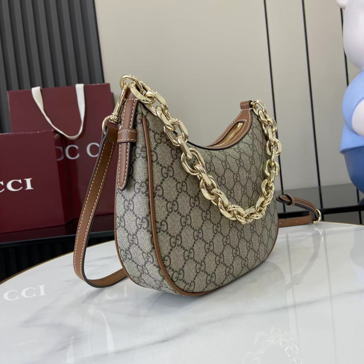 Gucci GG Emblem Medium Shoulder Bag - FashionPlug