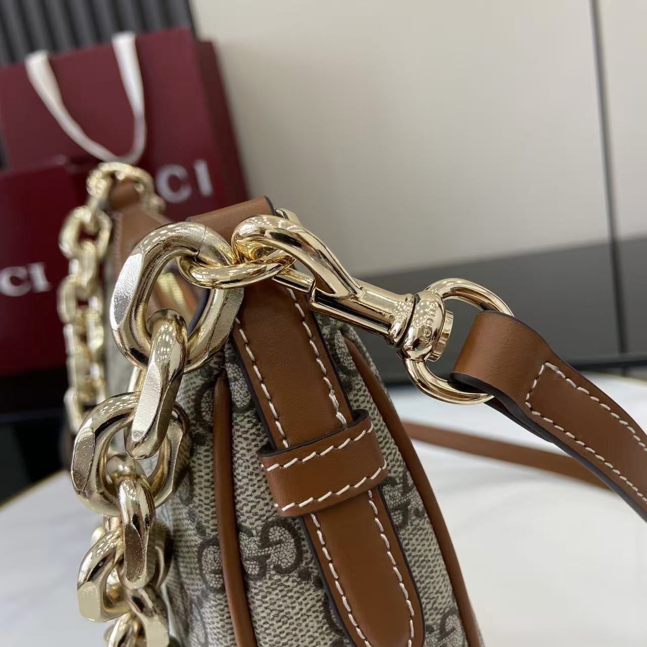 Gucci GG Emblem Medium Shoulder Bag - FashionPlug