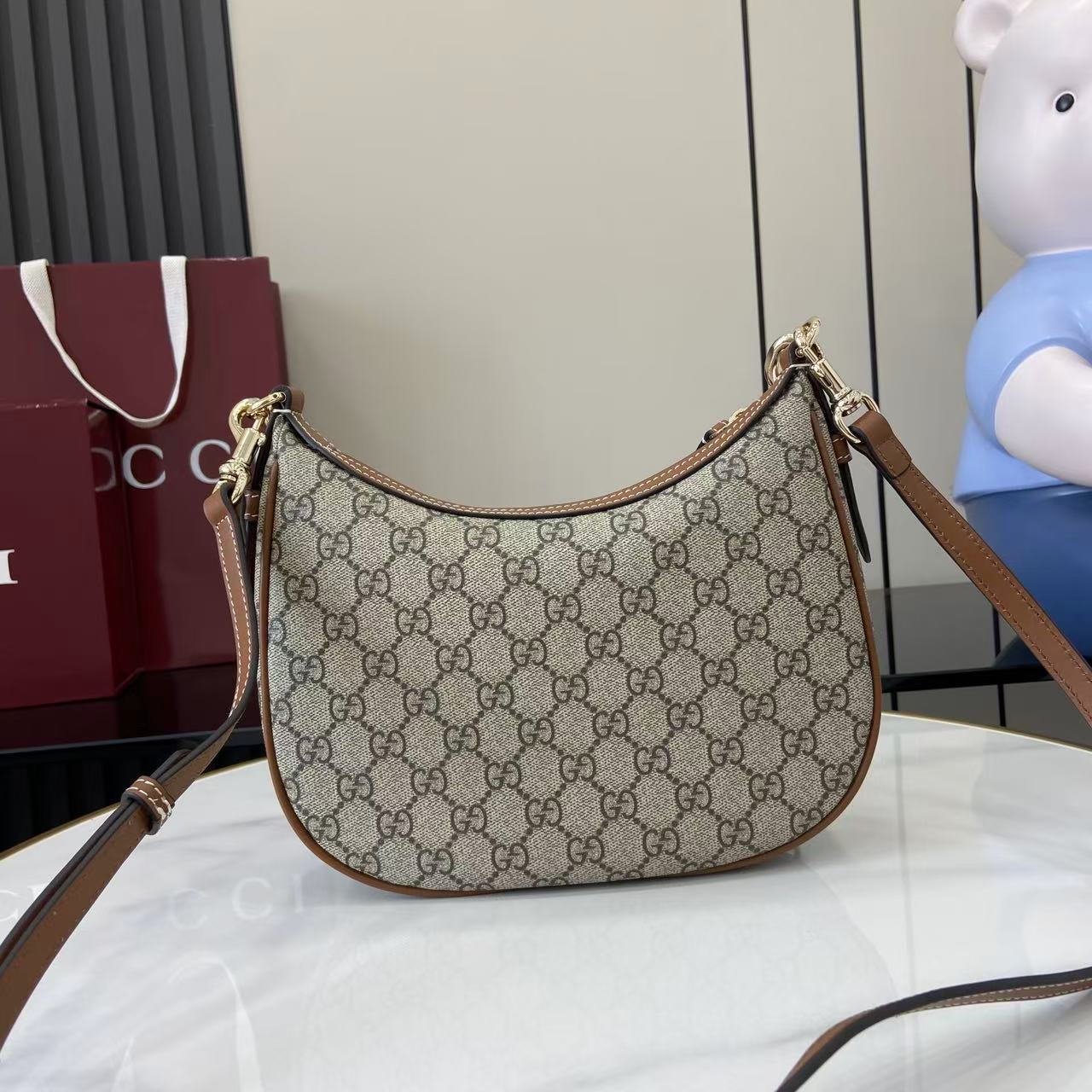 Gucci GG Emblem Medium Shoulder Bag - FashionPlug