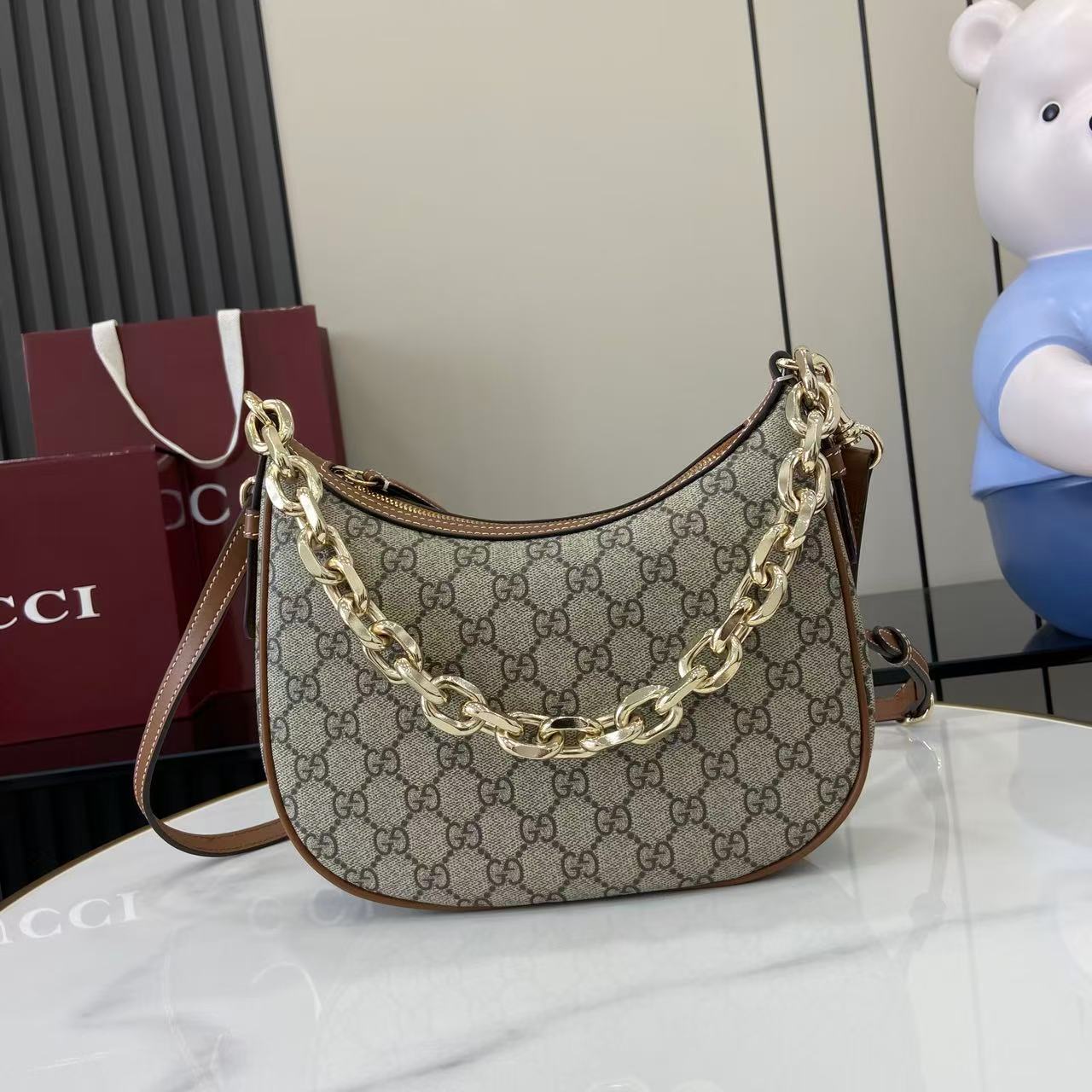 Gucci GG Emblem Medium Shoulder Bag - FashionPlug