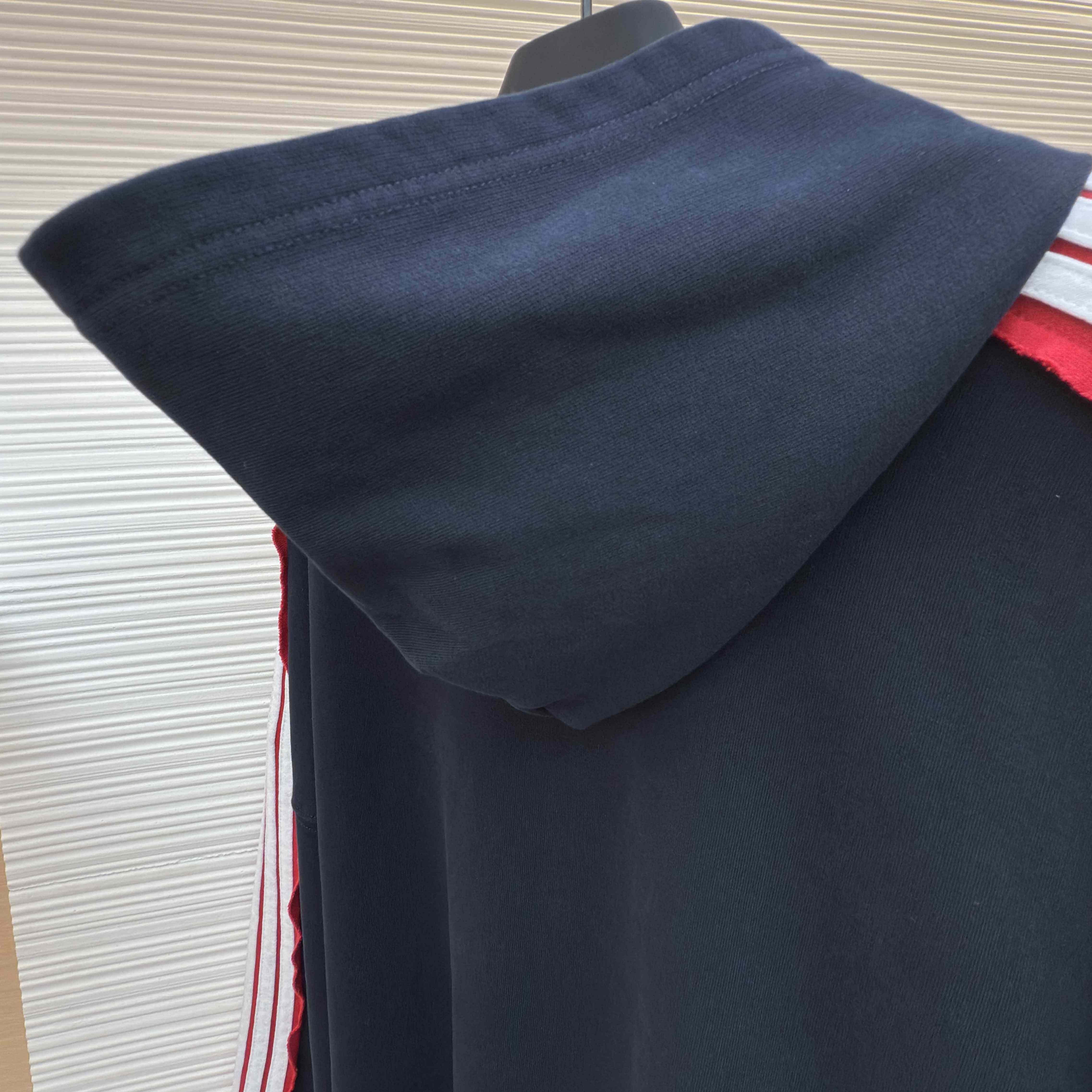 Balenciaga Unity Sports Icon Large Hoodie in faded black and white dry fleece - FashionPlug