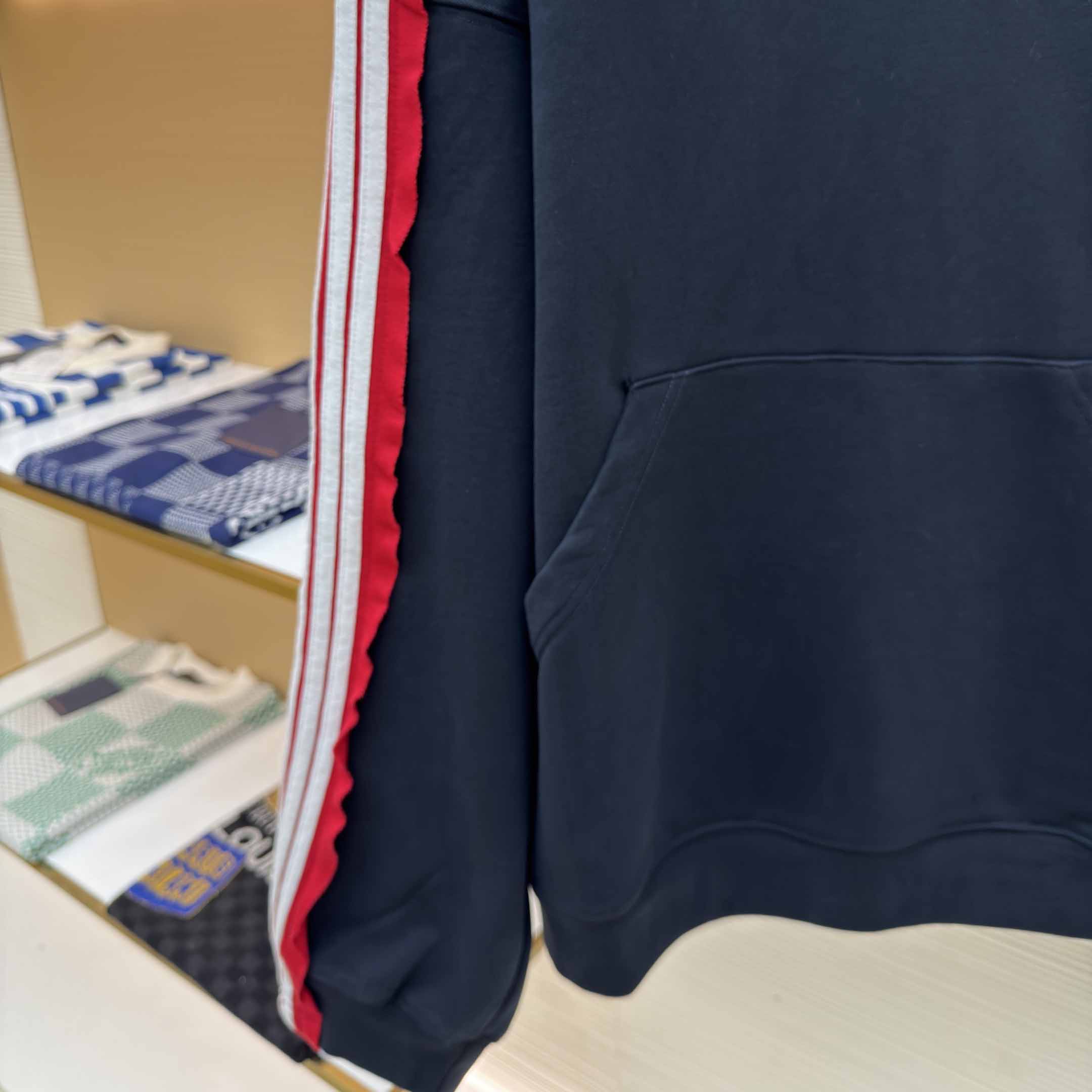 Balenciaga Unity Sports Icon Large Hoodie in faded black and white dry fleece - FashionPlug