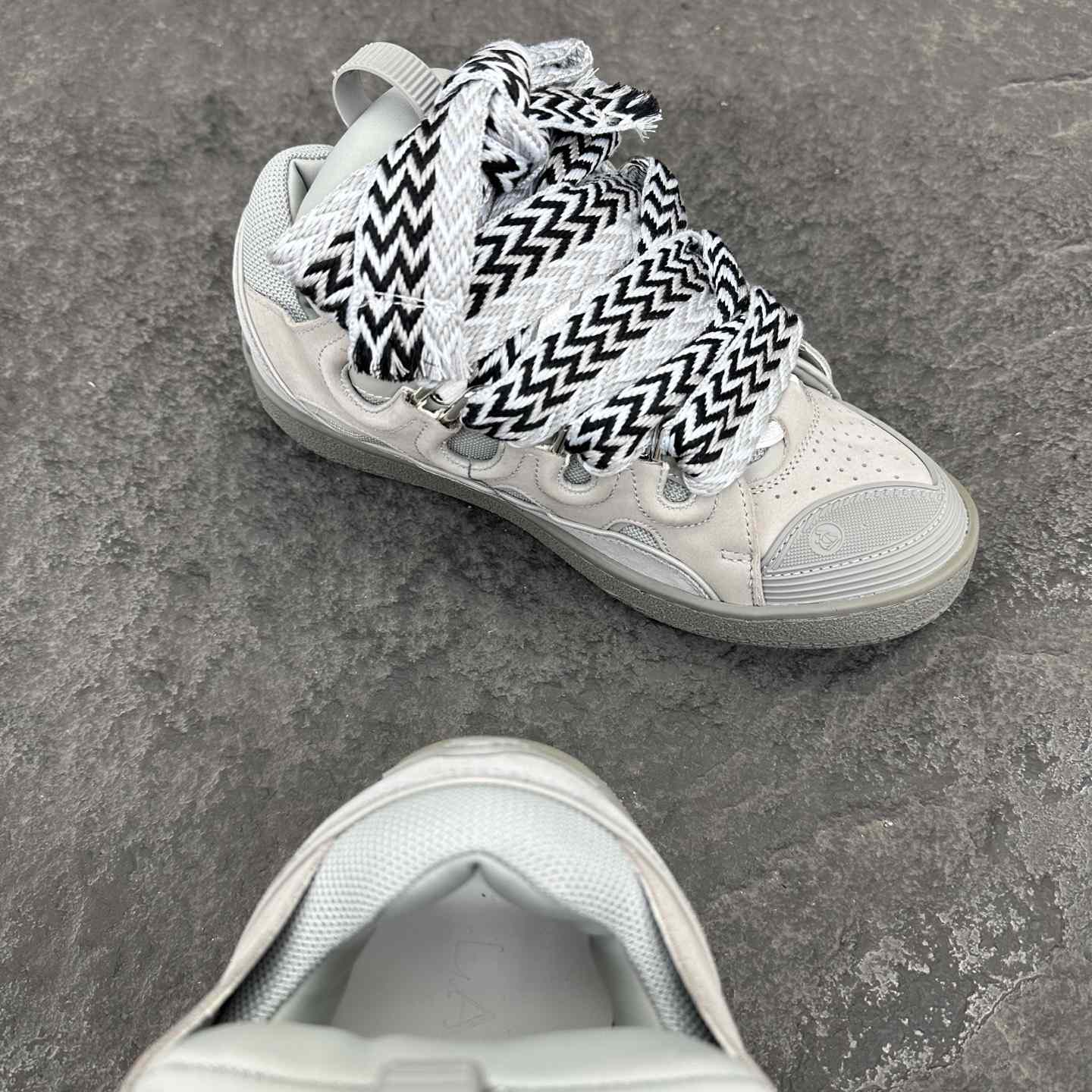 Lanvin Leather Curb Sneakers - FashionPlug