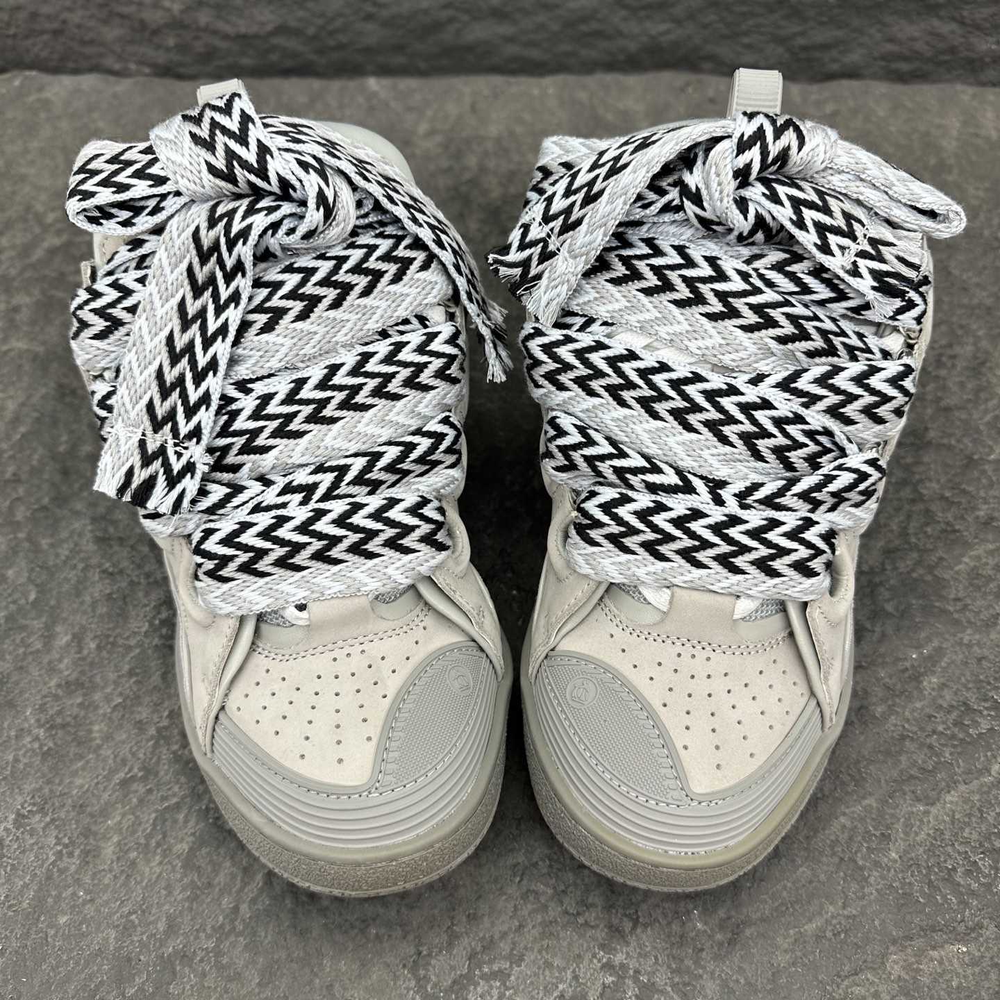 Lanvin Leather Curb Sneakers - FashionPlug