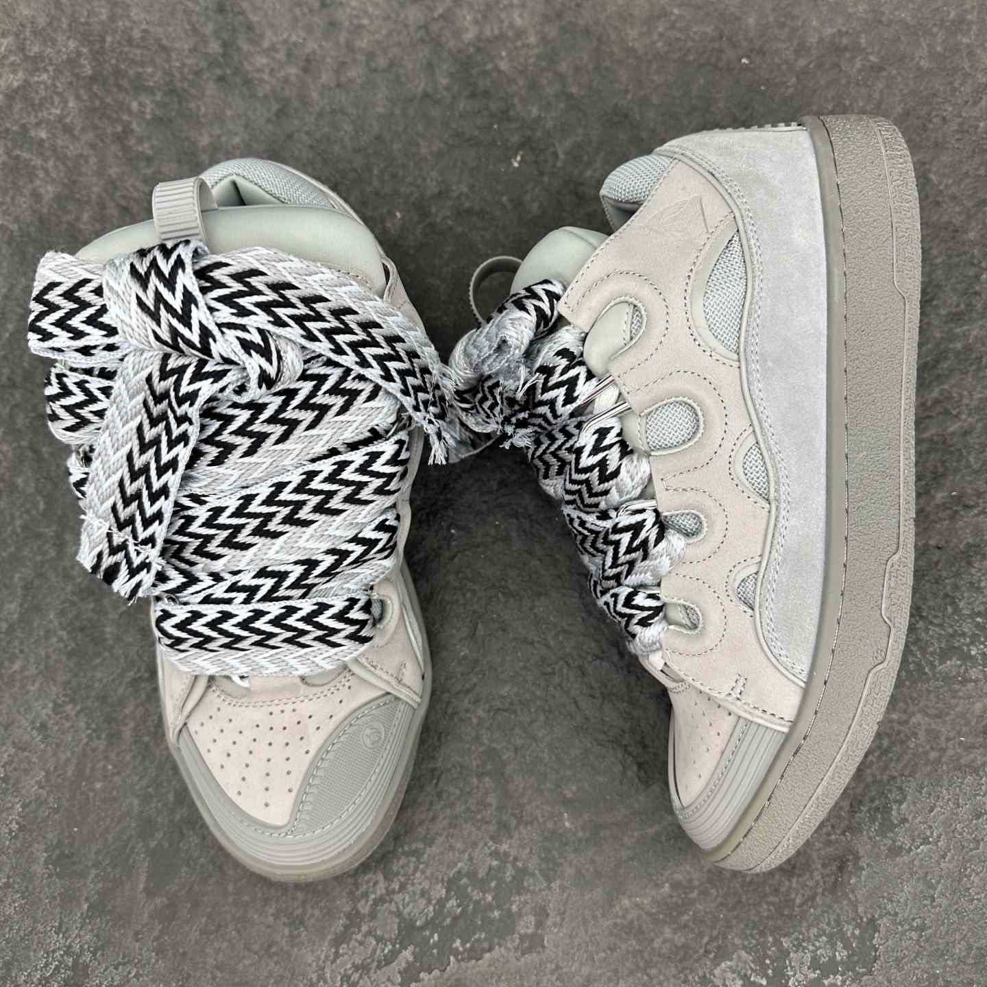 Lanvin Leather Curb Sneakers - FashionPlug