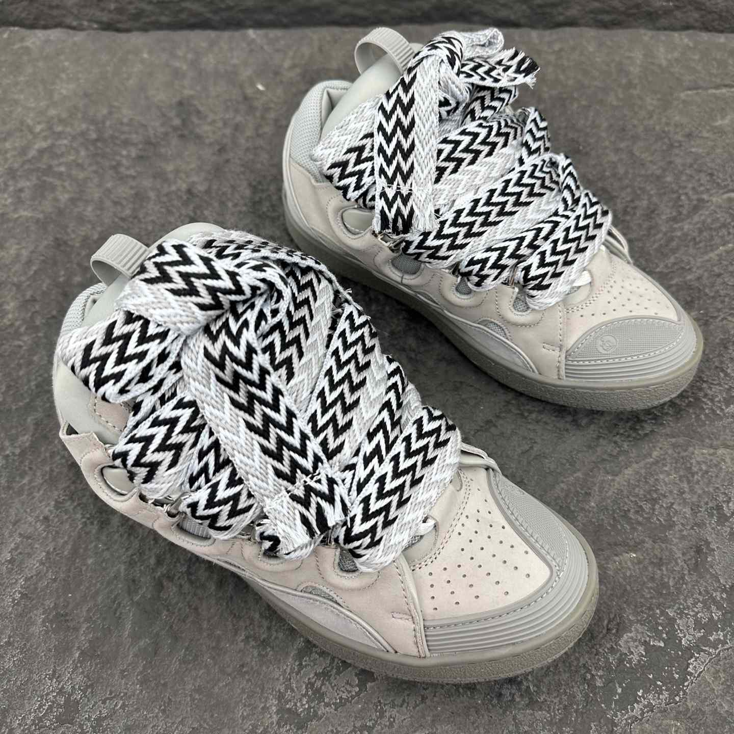 Lanvin Leather Curb Sneakers - FashionPlug