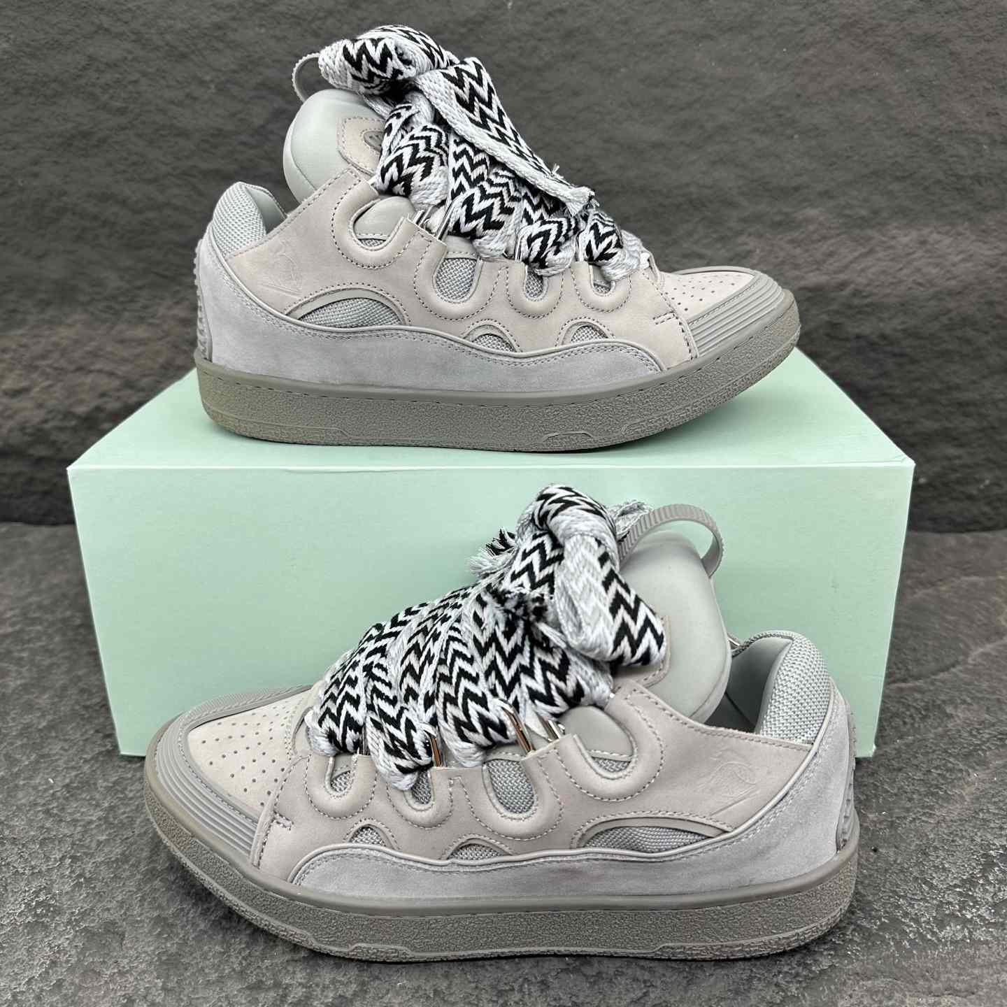 Lanvin Leather Curb Sneakers - FashionPlug