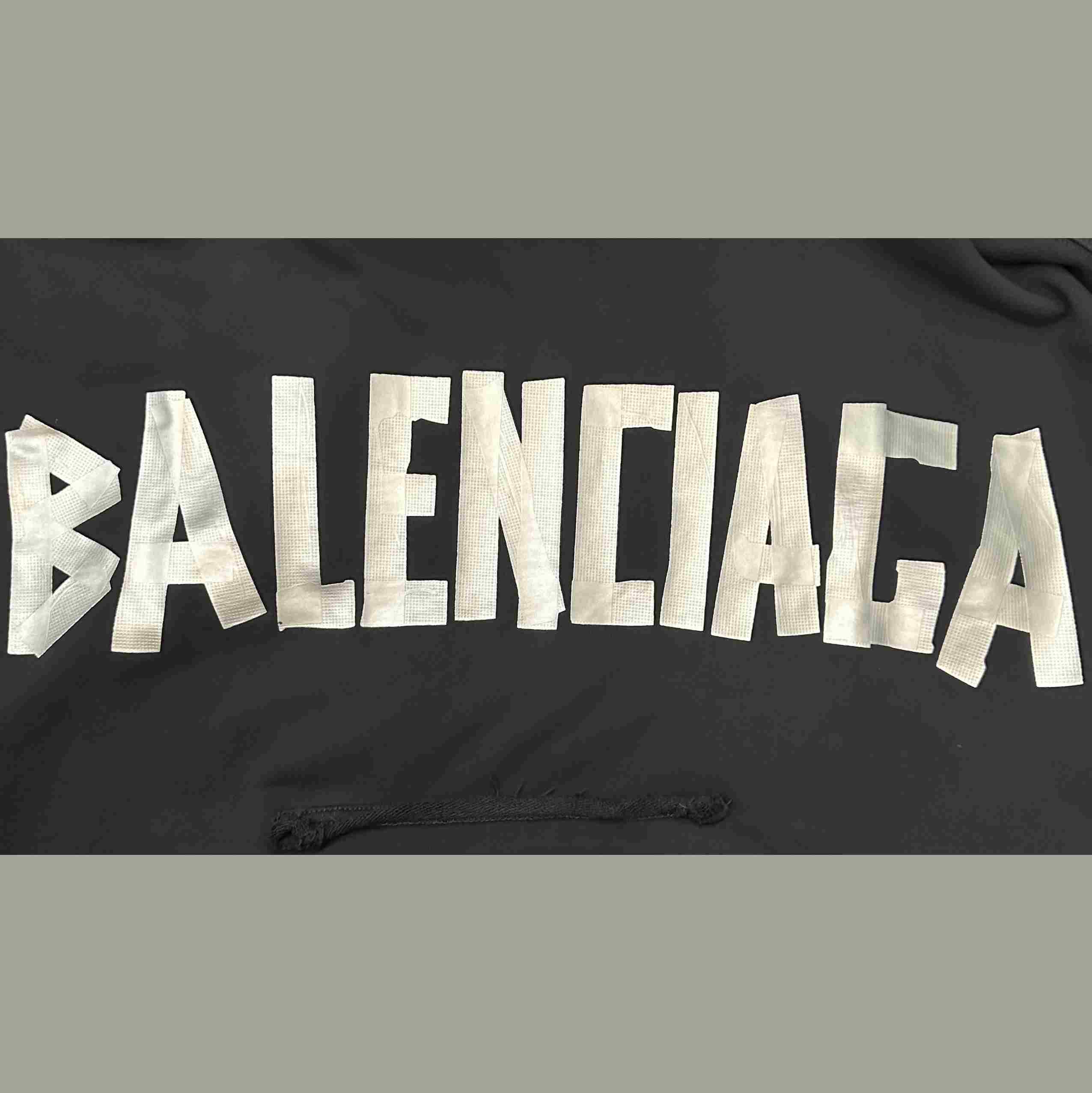 Balenciaga Tape Type Ripped Hoodie - FashionPlug