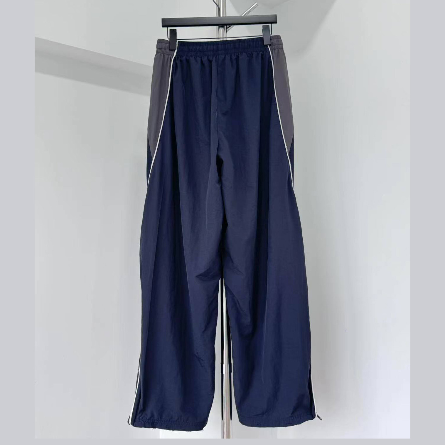 Balenciaga I PUMA Tracksuit Pants In Elephant Grey - FashionPlug