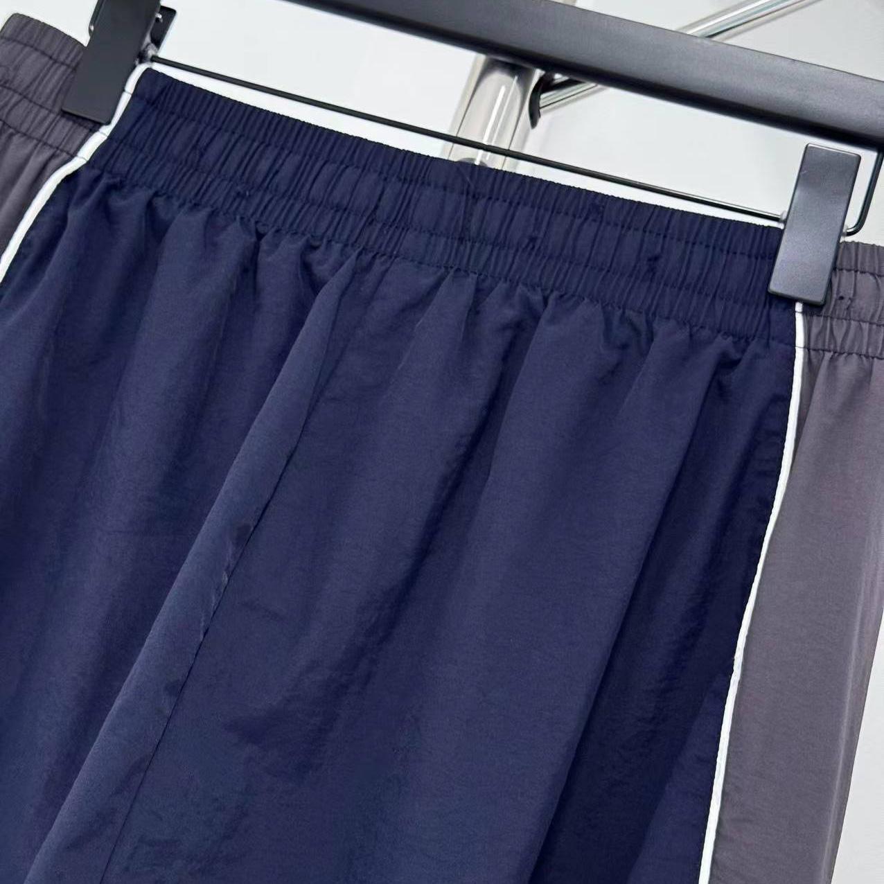 Balenciaga I PUMA Tracksuit Pants In Elephant Grey - FashionPlug