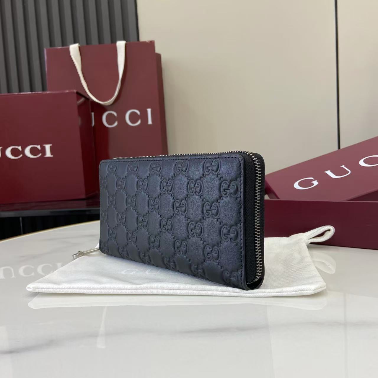 Gucci GG Emblem Zip Around Wallet - FashionPlug