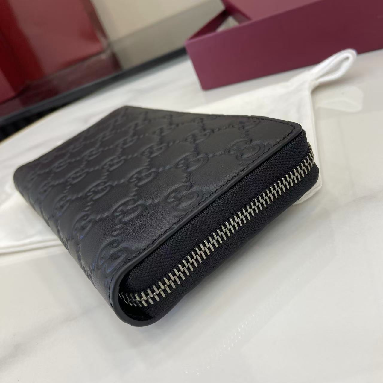 Gucci GG Emblem Zip Around Wallet - FashionPlug