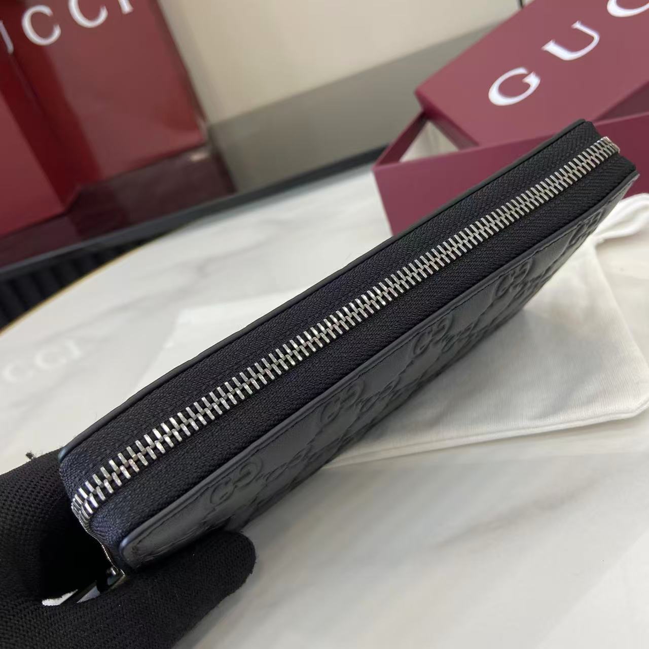 Gucci GG Emblem Zip Around Wallet - FashionPlug